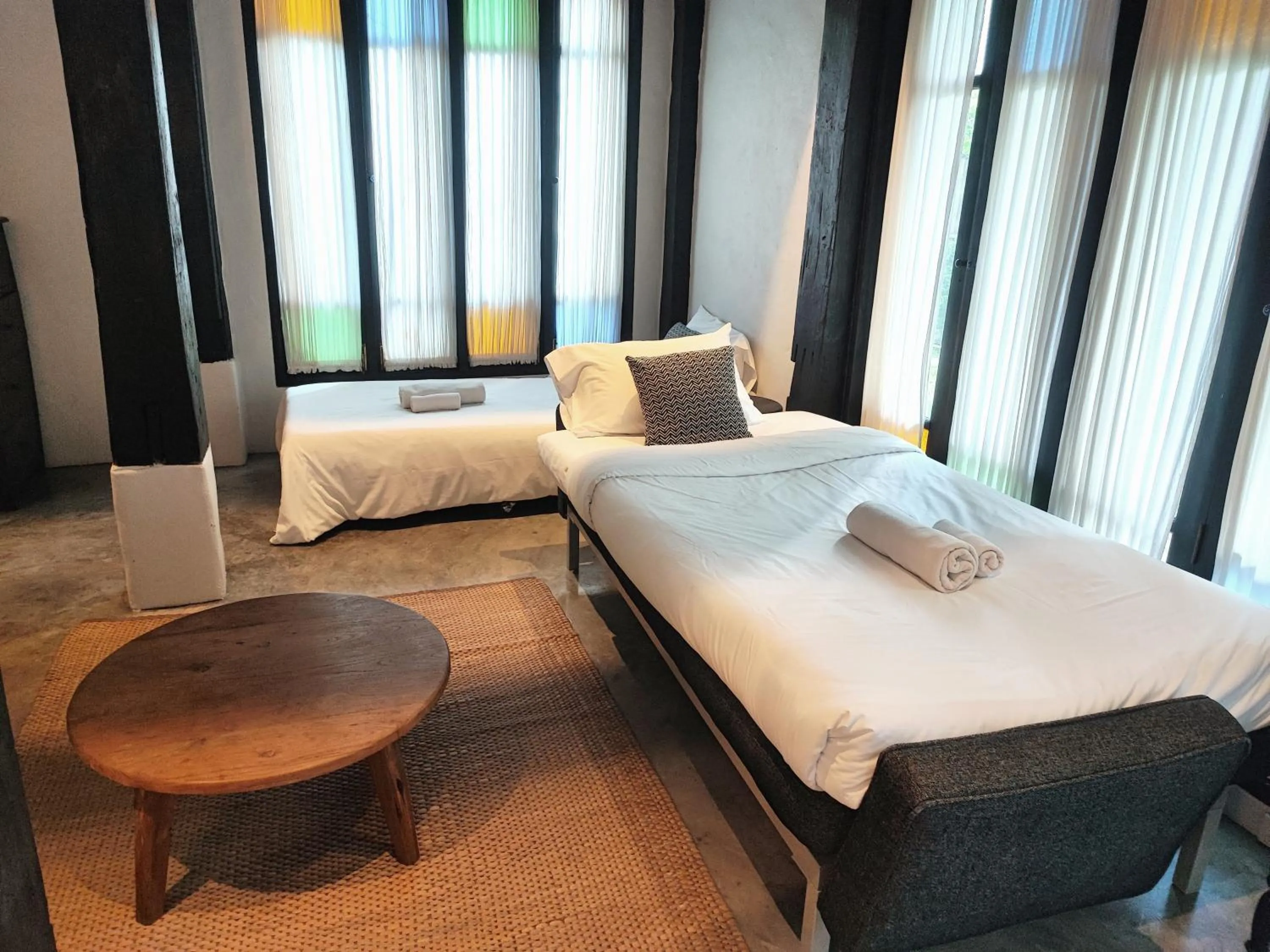 Bed in Chotana Villa Hotel Chiang Mai