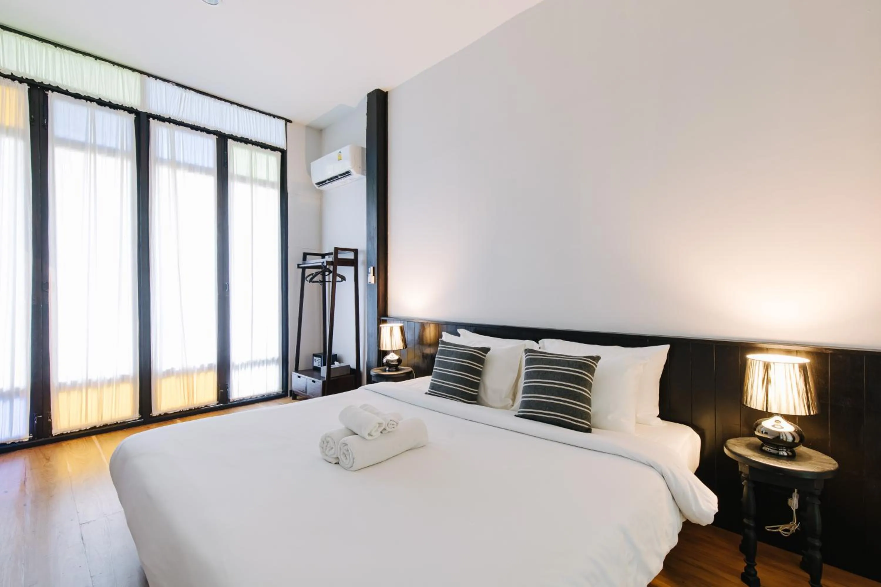 Bed in Chotana Villa Hotel Chiang Mai