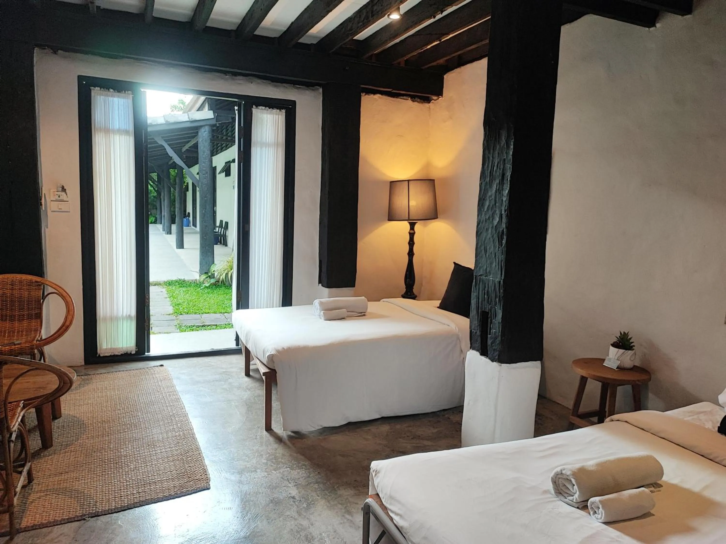 Bed in Chotana Villa Hotel Chiang Mai