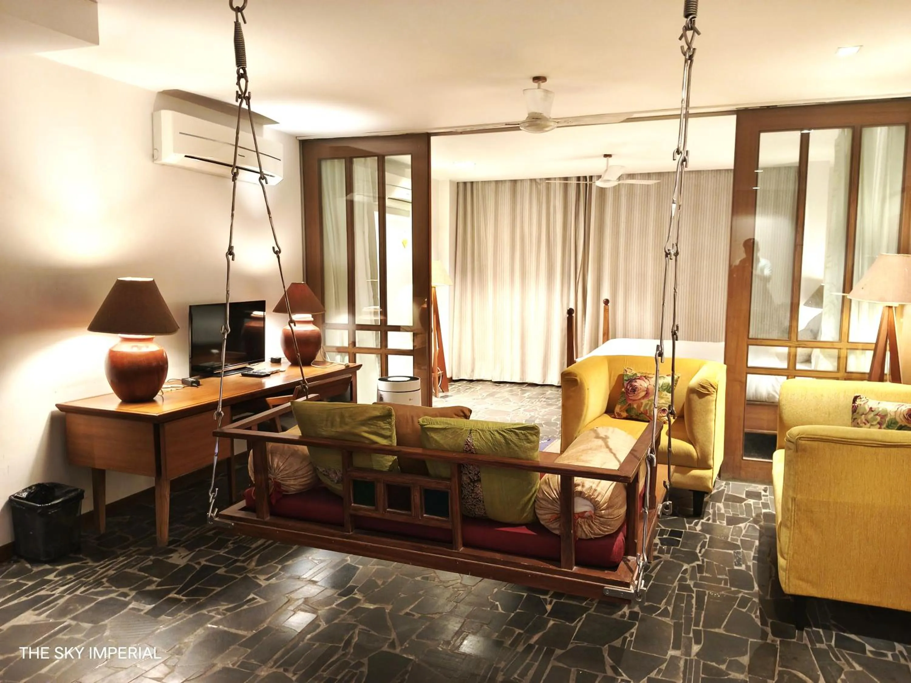 Seating area in The Sky Imperial Aarivaa Luxury Stays