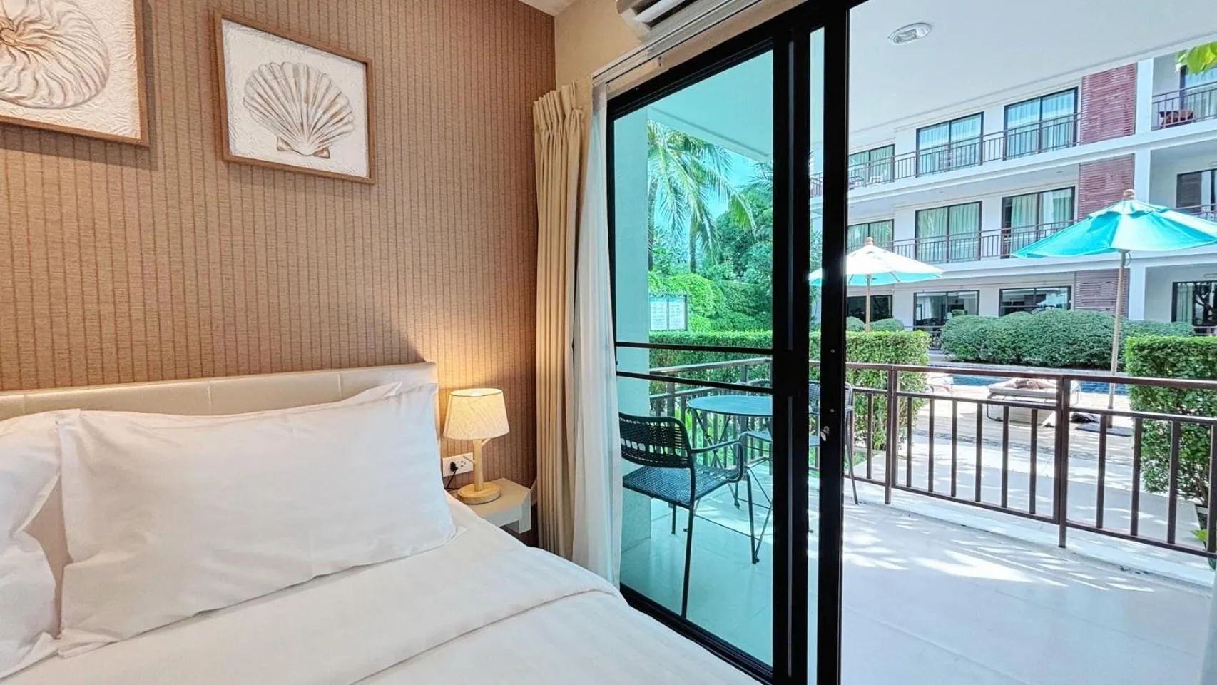 Bed in The Title KR Beach Condotel Rawai Beach