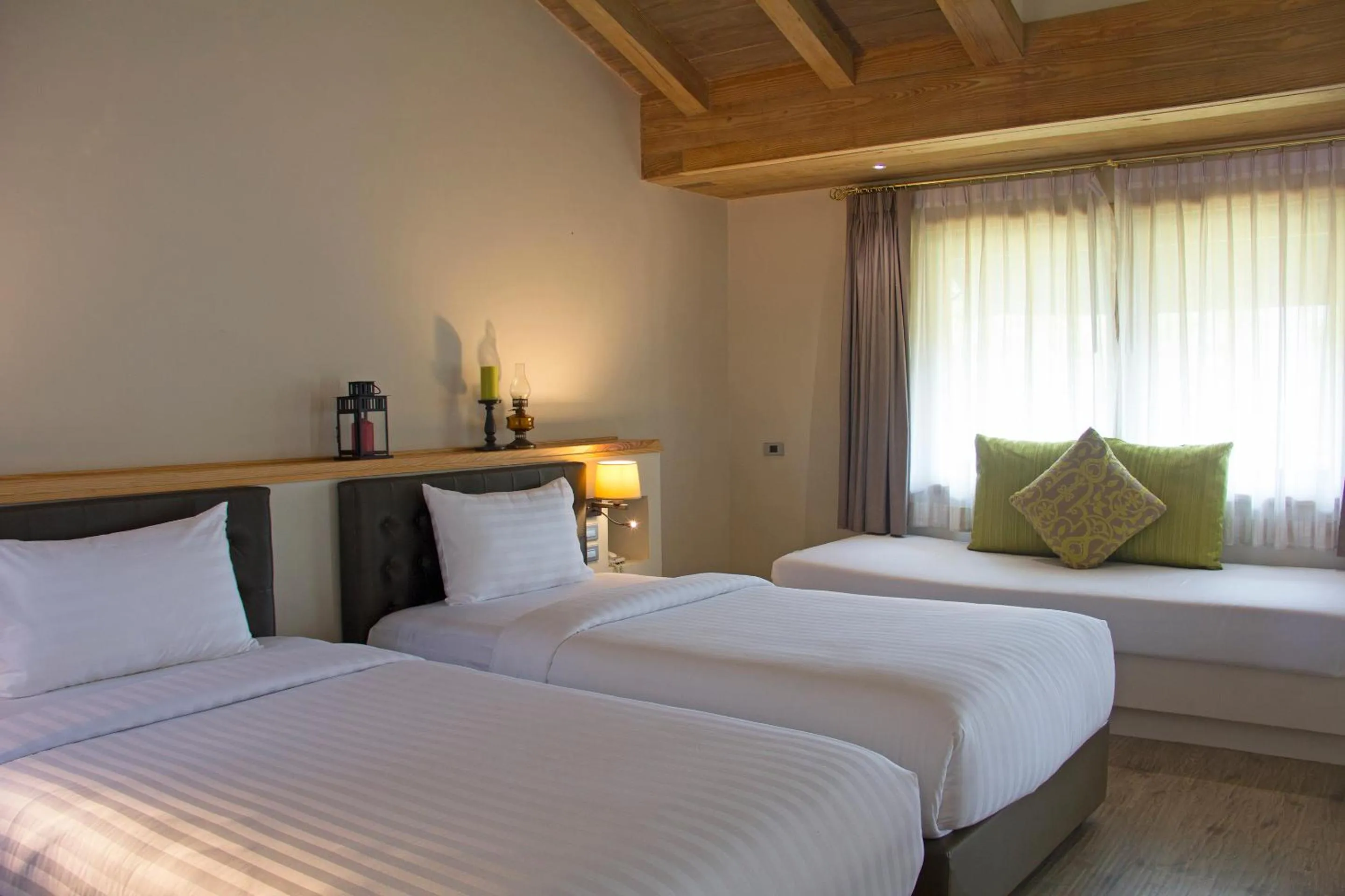 Bed in Mela Garden Retreat Cottage