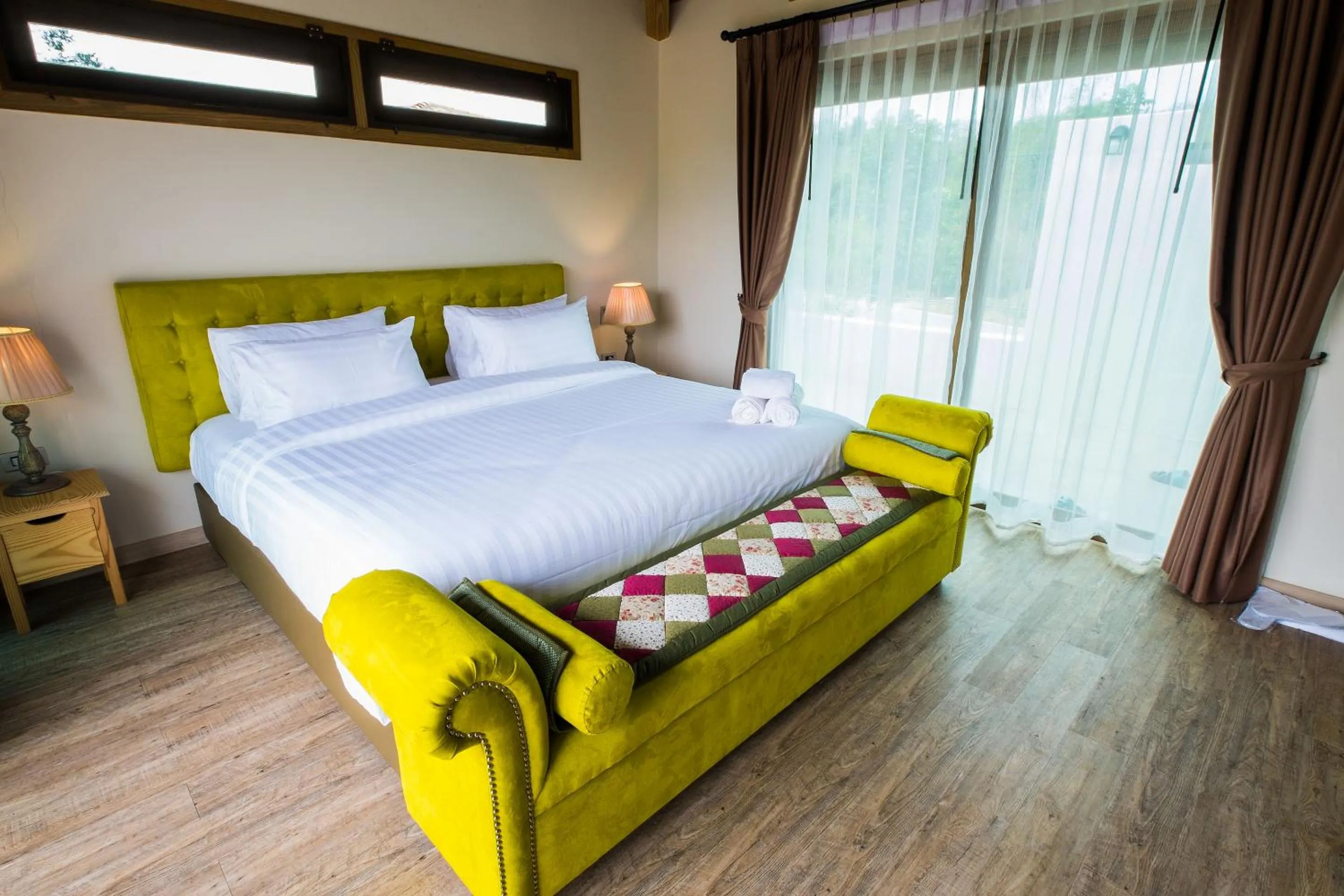 Bed in Mela Garden Retreat Cottage