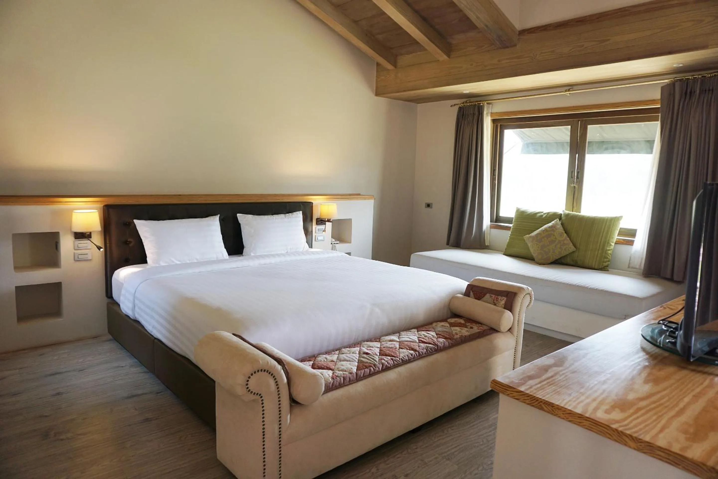 Bed in Mela Garden Retreat Cottage