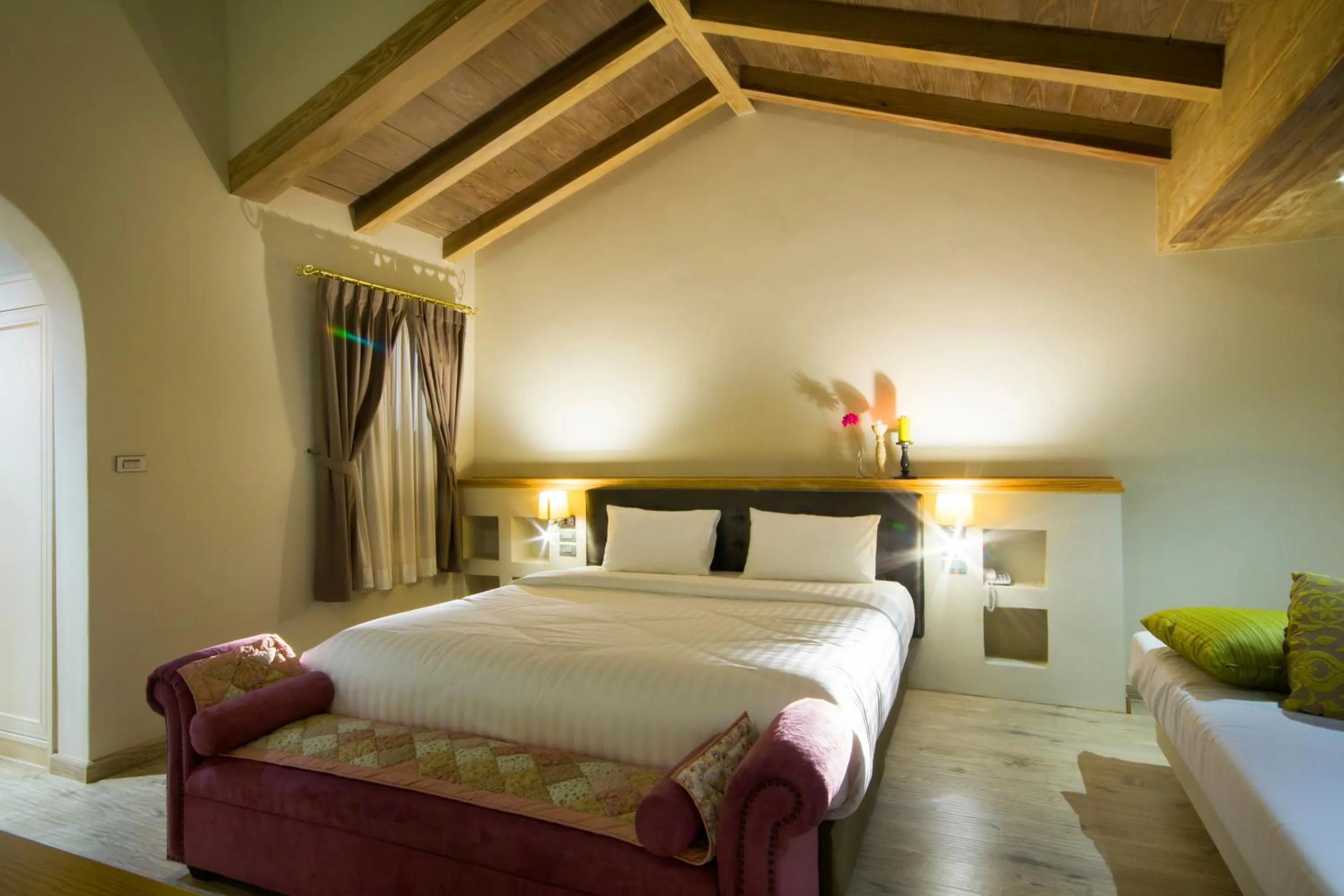 Bed in Mela Garden Retreat Cottage