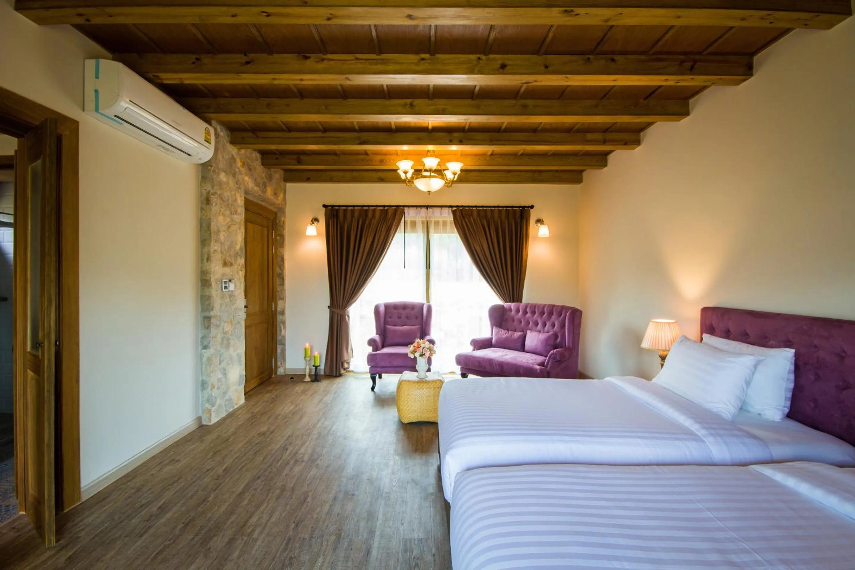 Bed in Mela Garden Retreat Cottage