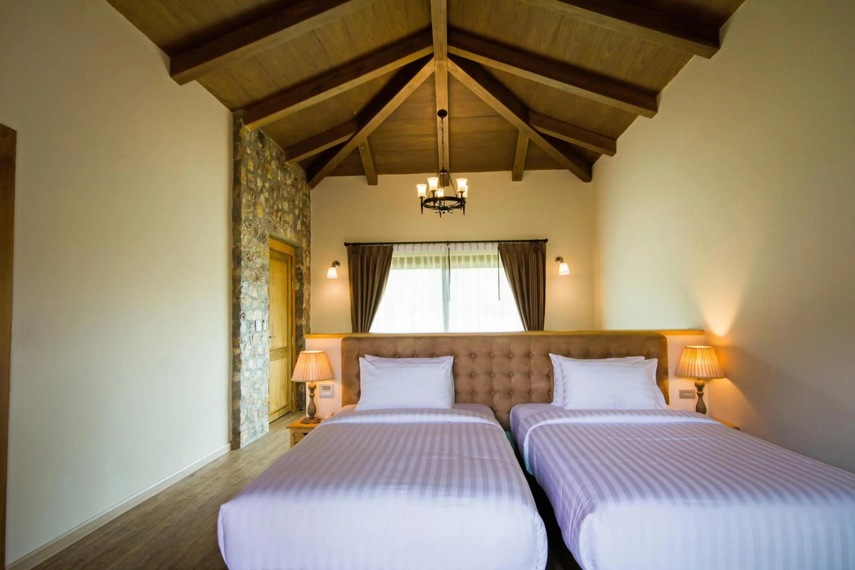 Bed in Mela Garden Retreat Cottage