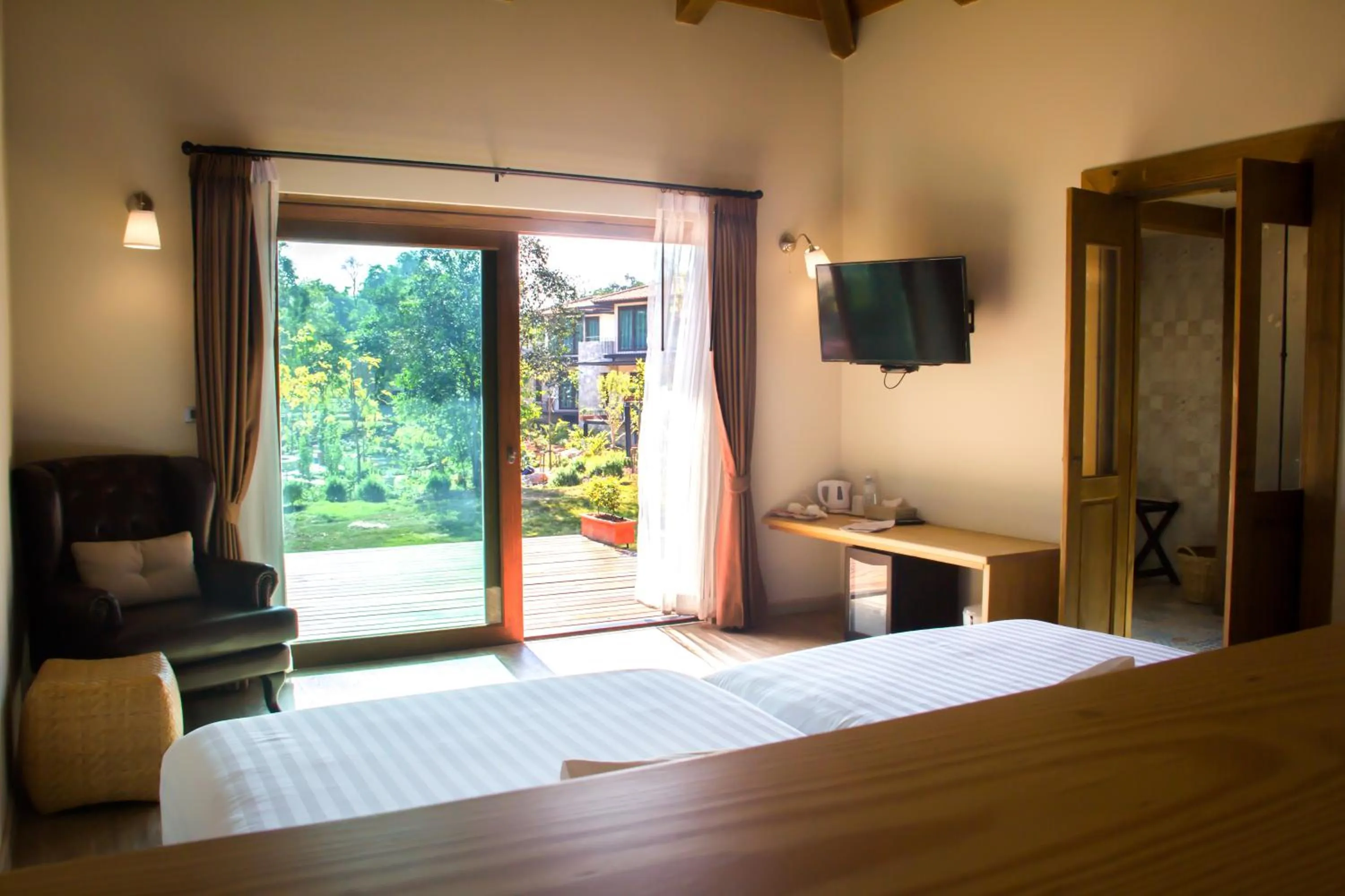 Bed in Mela Garden Retreat Cottage