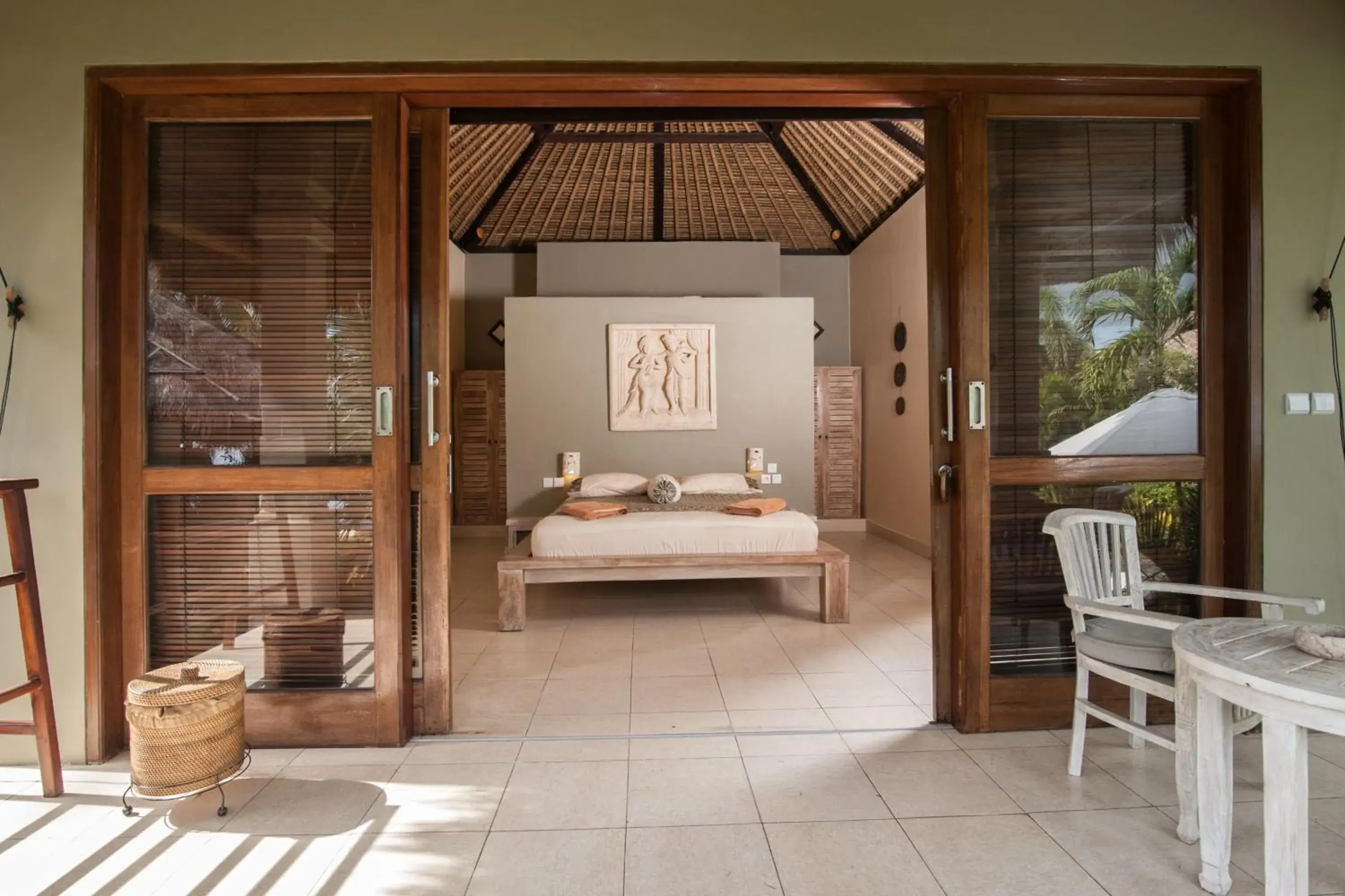 Seating area, Bed in Relax Bali Resort, Diving & SPA, ocean front Seating area, Bed in Relax Bali Resort, Diving & SPA, ocean front