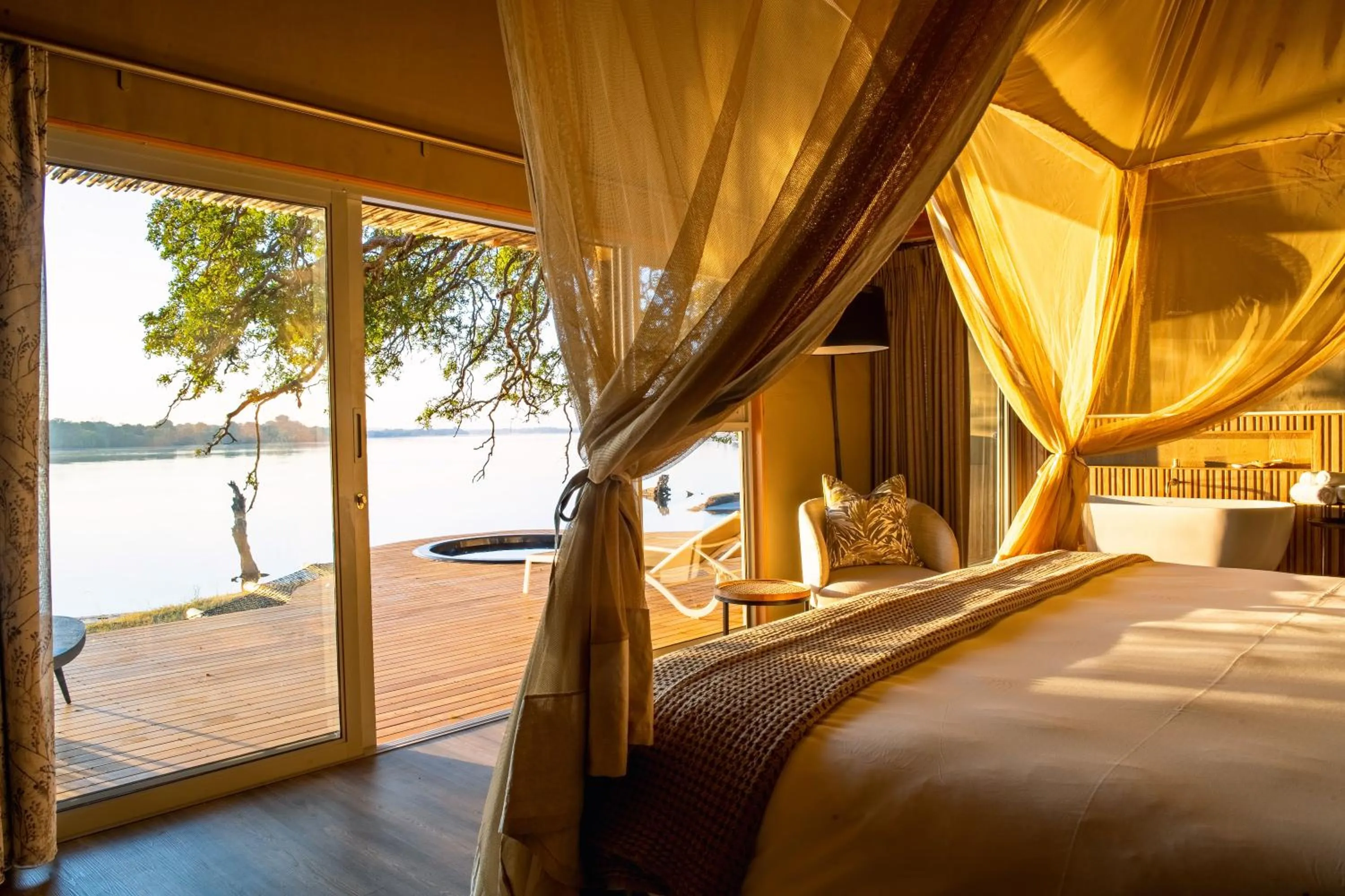 River view, Bed in Victoria Falls River Lodge