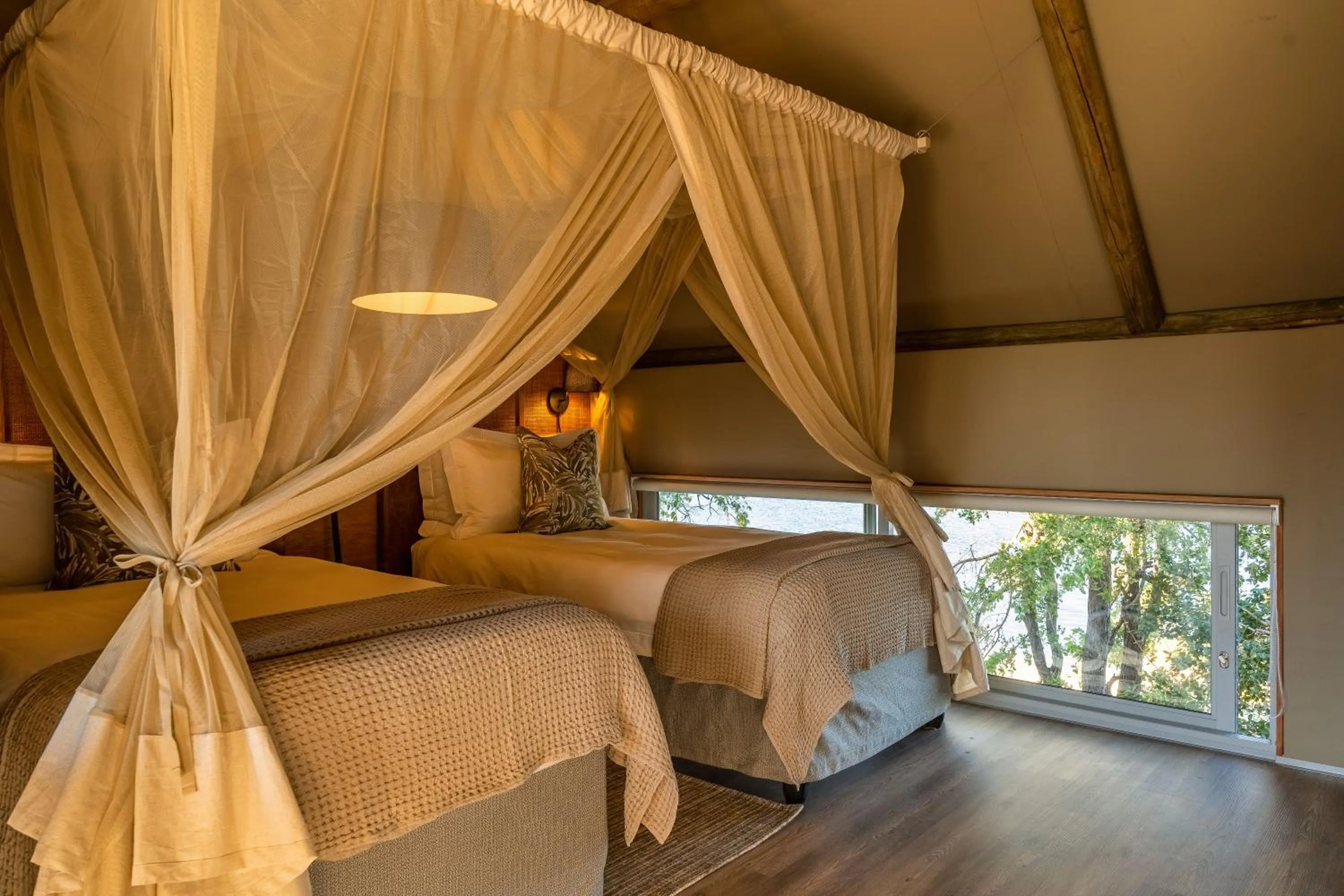 River view, Bed in Victoria Falls River Lodge