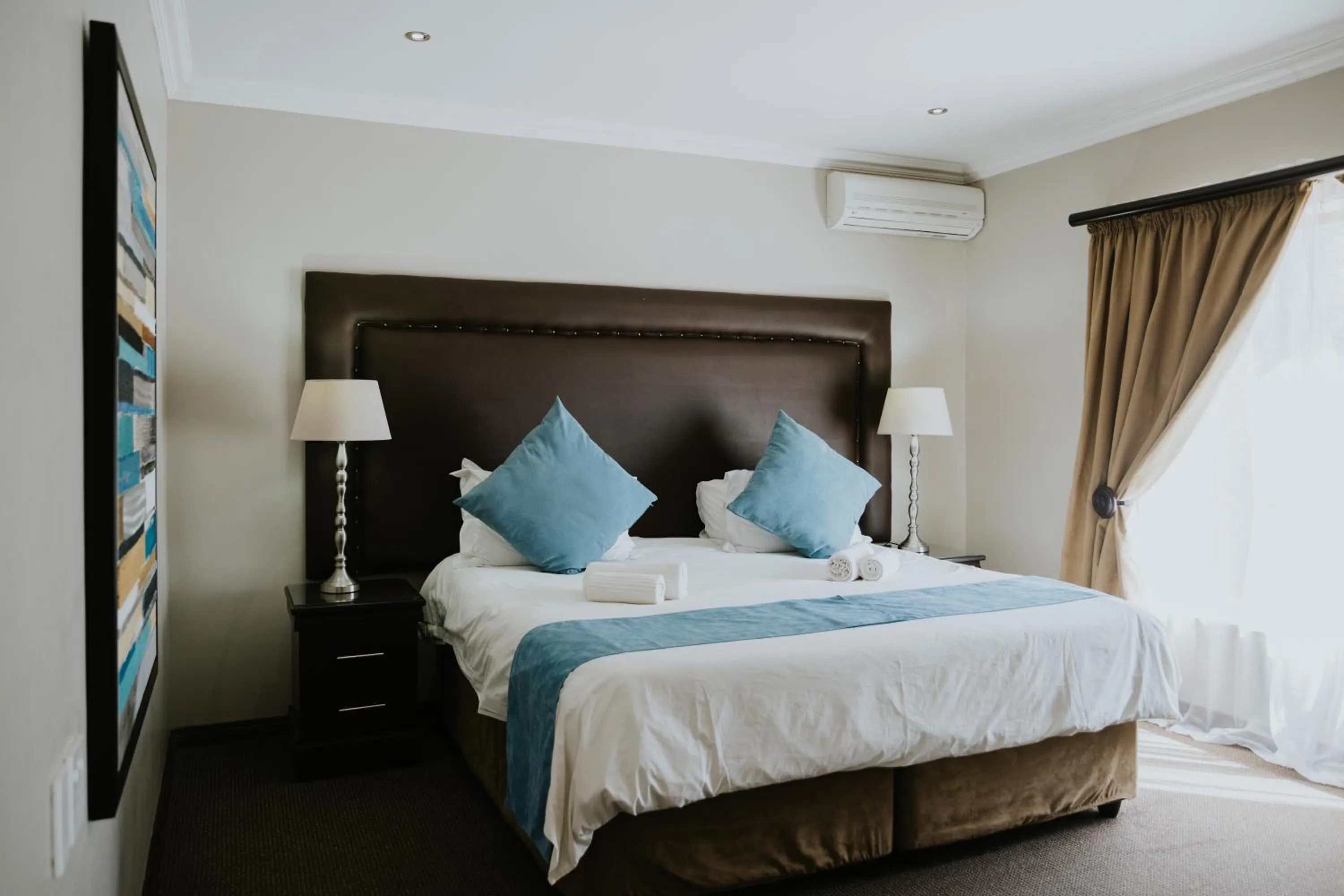 Bed in Le Grand Chateau Hotel