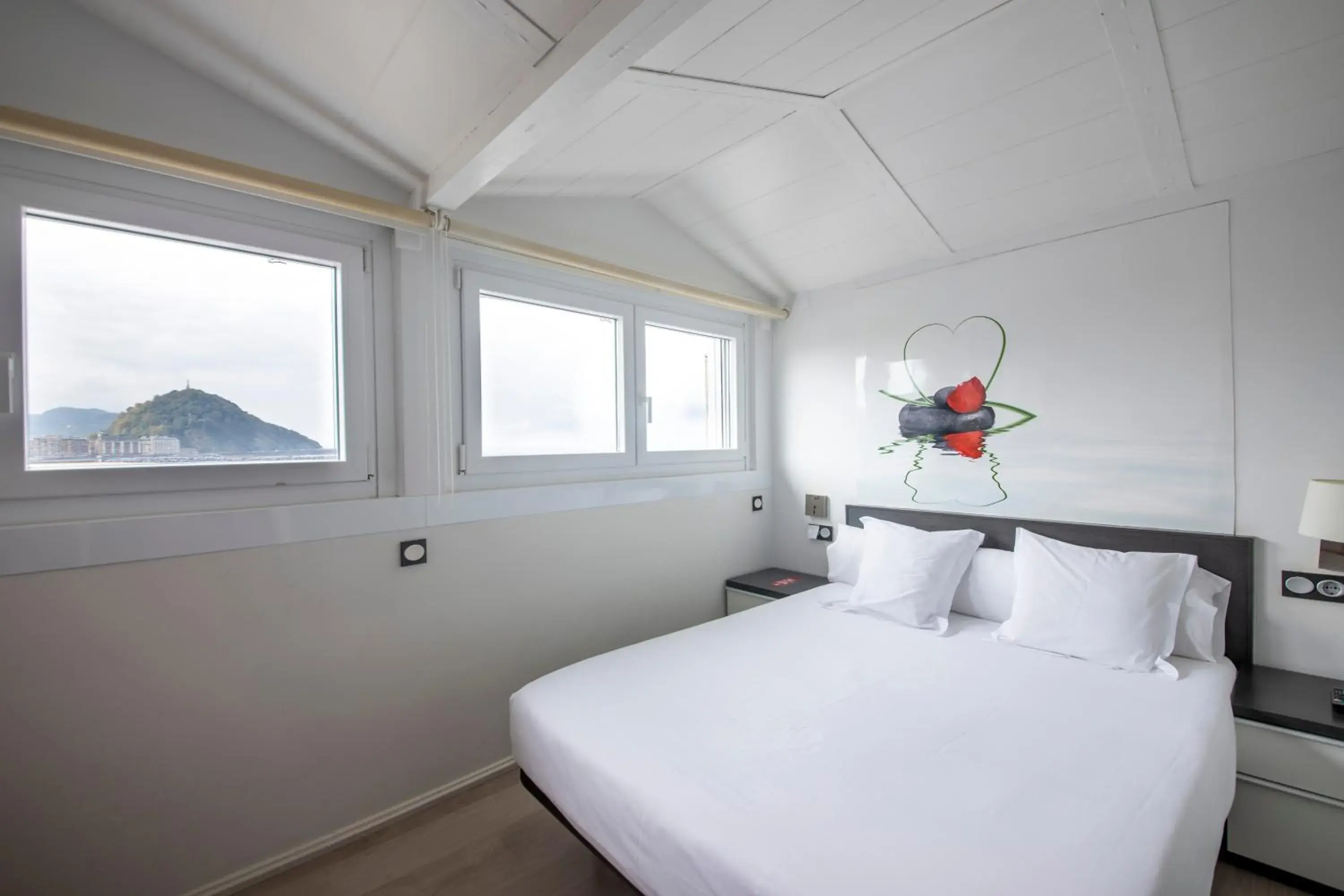 Bed in Hotel Punta Monpas Bed in Hotel Punta Monpas