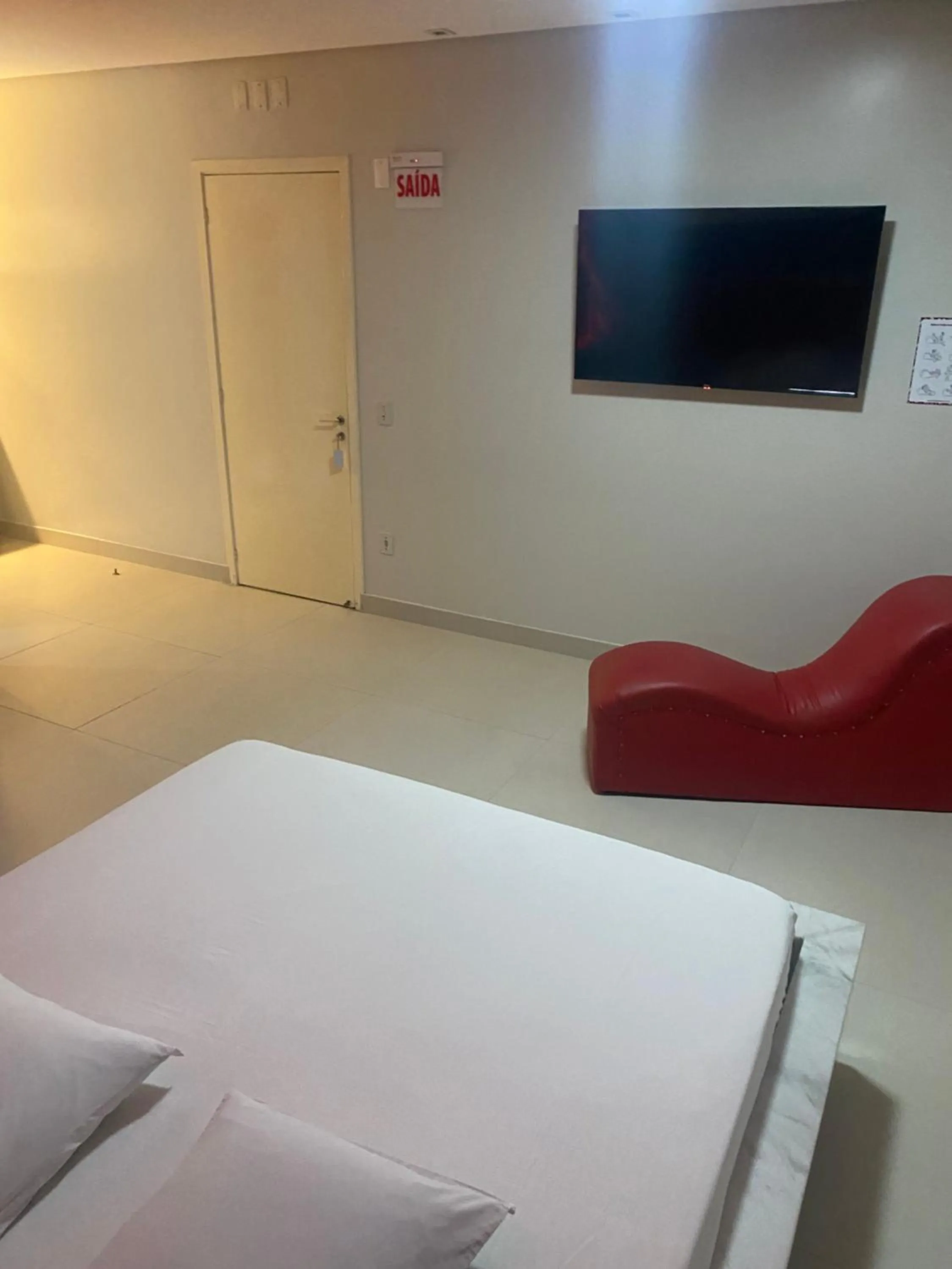 Photo of the whole room, Bed in Passione Criciúma - Adult Only