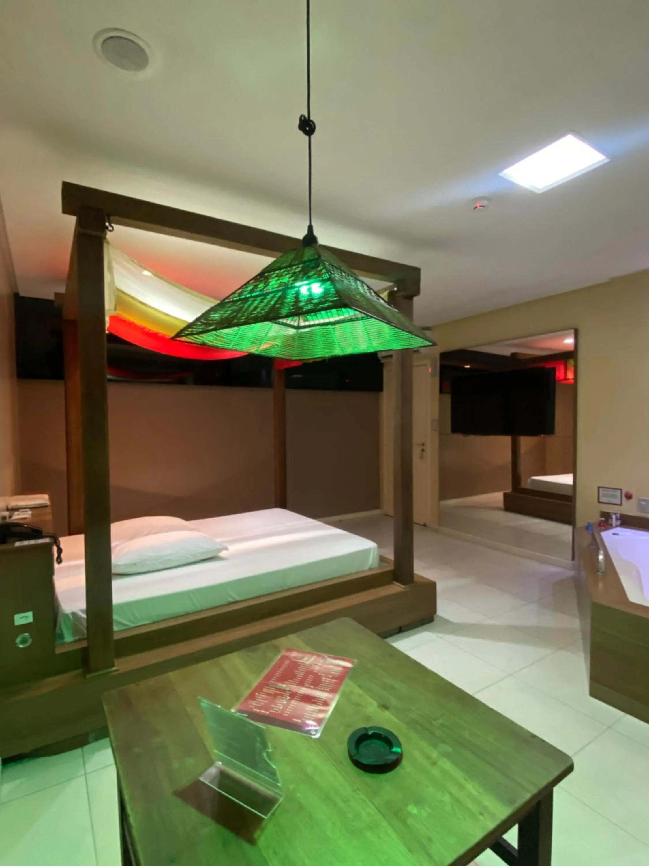 Photo of the whole room, Bed in Passione Criciúma - Adult Only