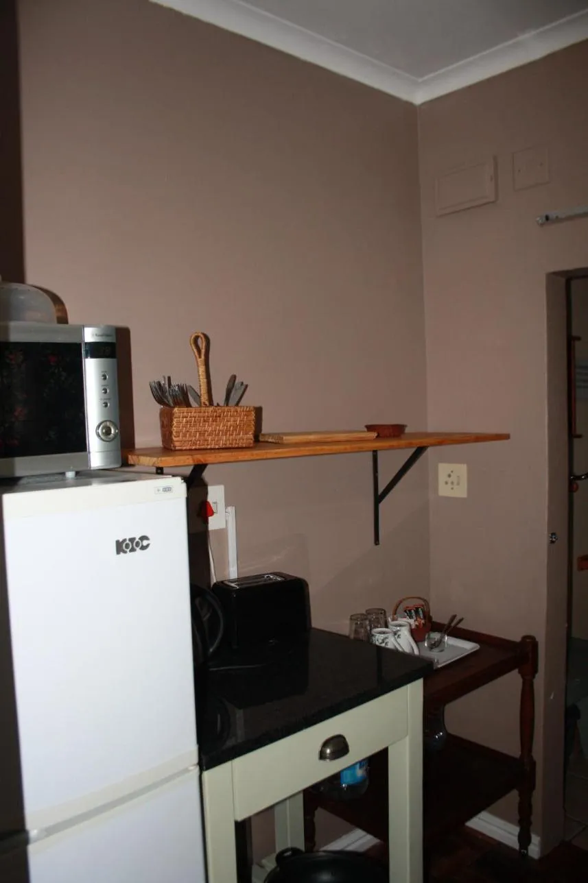 Kitchen or kitchenette in A Garden Suite B&B