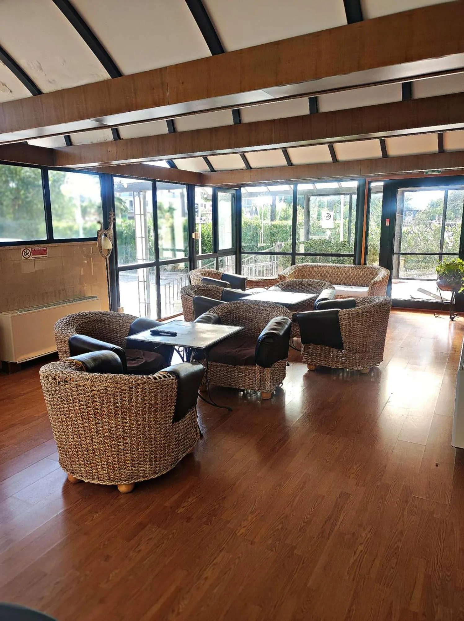 Communal lounge/ TV room in Hotel Holiday