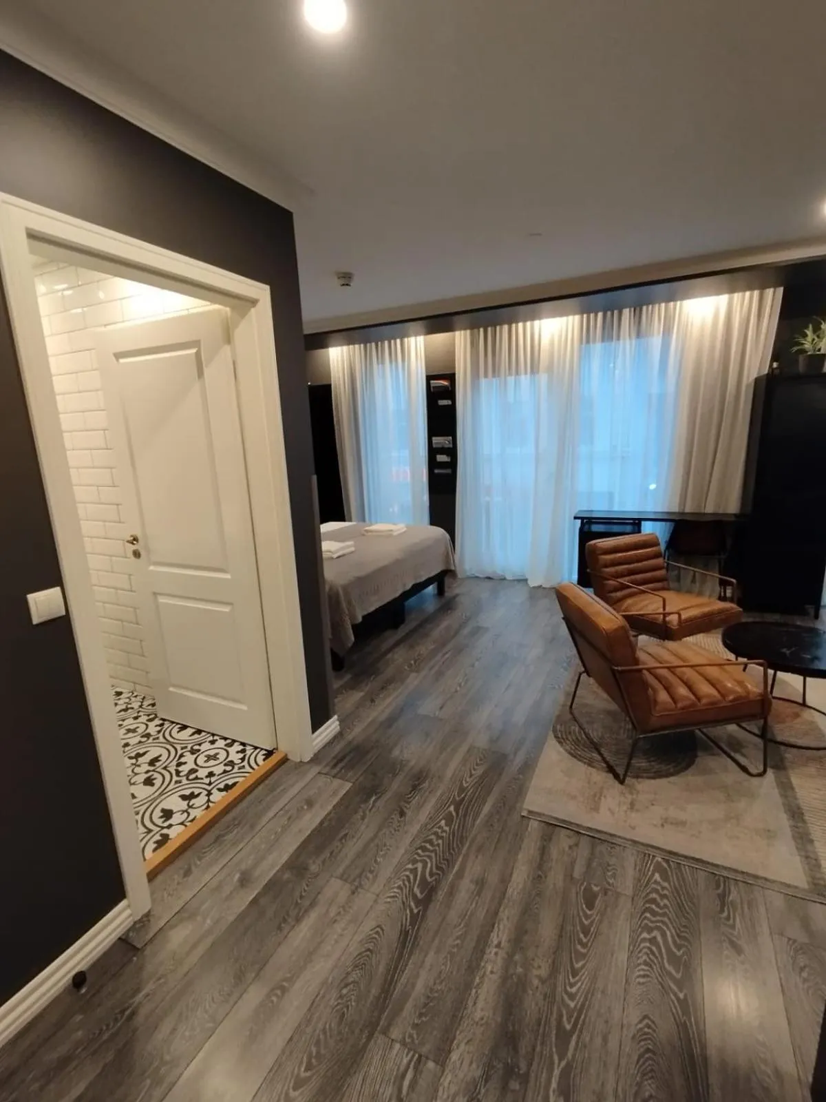 Seating area, Bed in Vintage Apartment Hotel