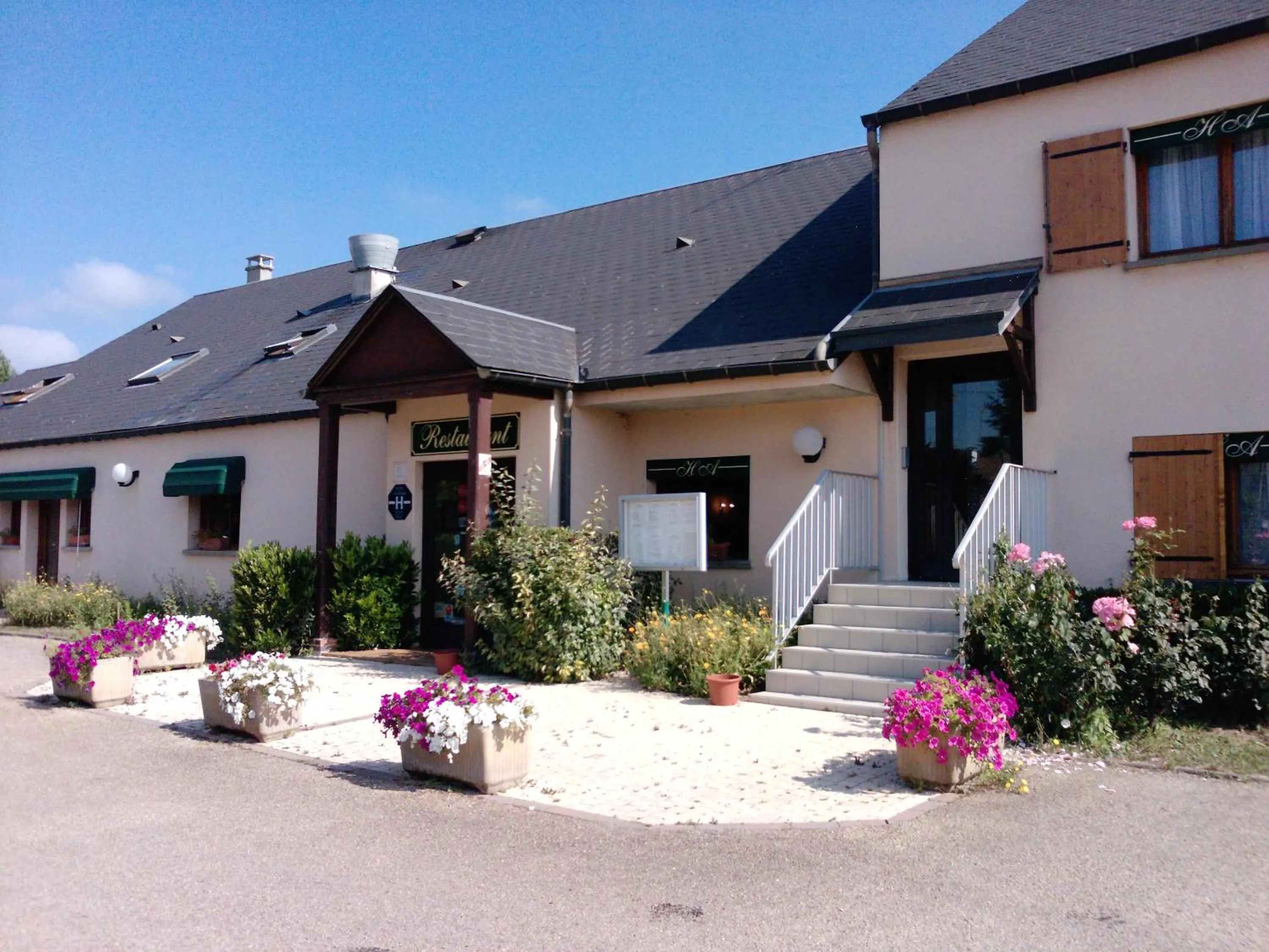 Property building in Logis Hotel Restaurant de l'Abbaye