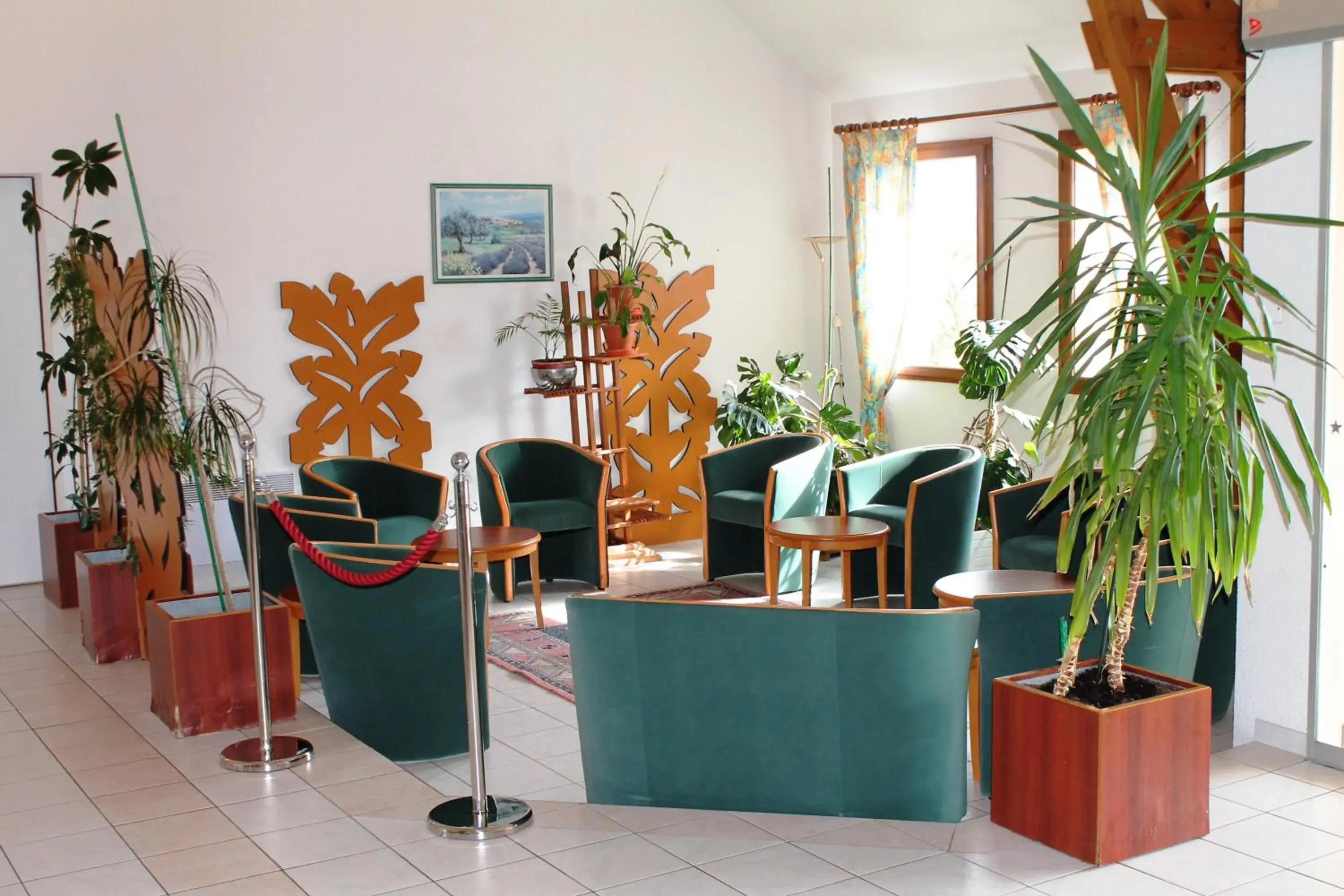 Lounge or bar in Logis Hotel Restaurant de l'Abbaye Lounge or bar in Logis Hotel Restaurant de l'Abbaye