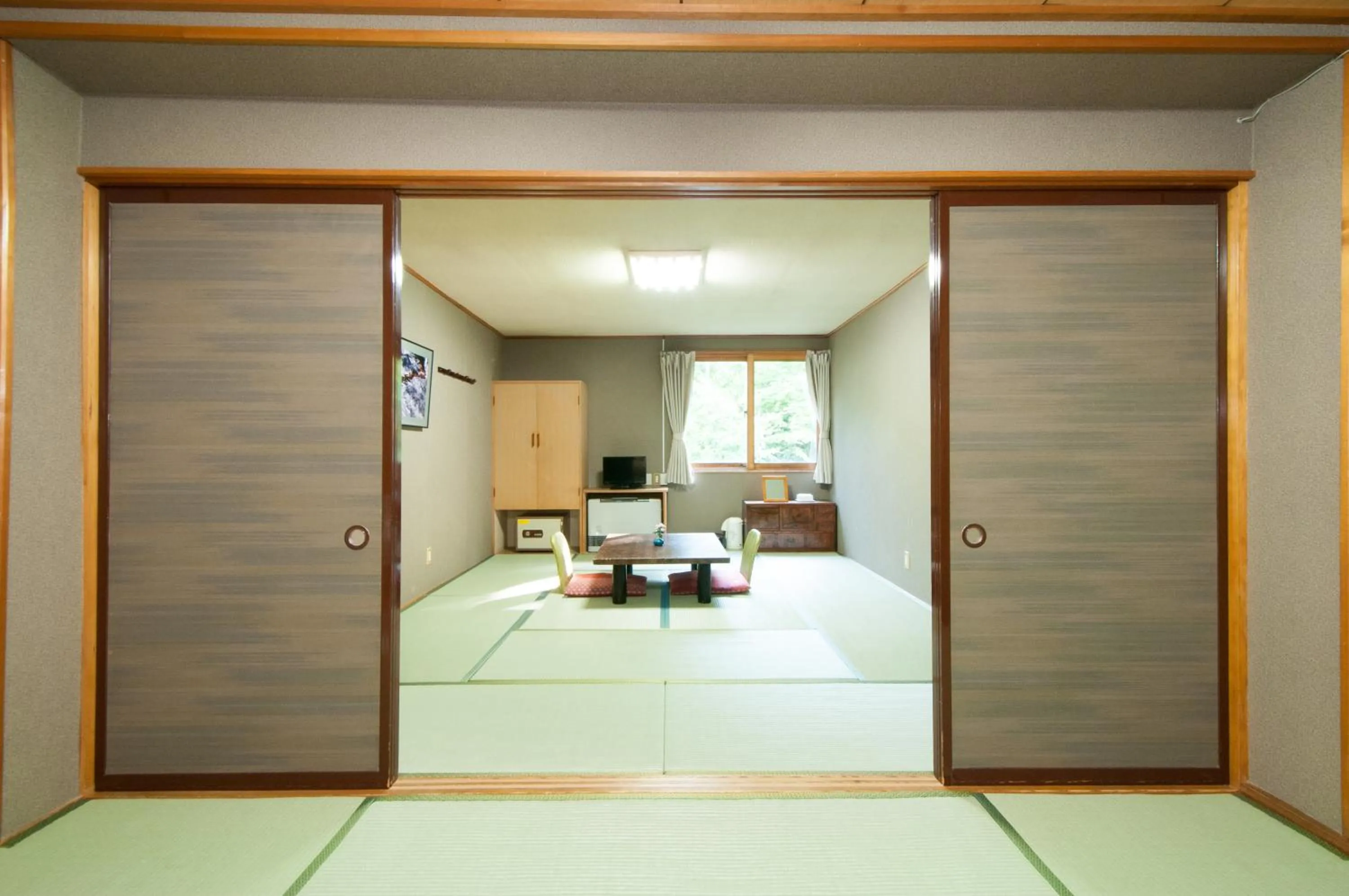 Photo of the whole room, Bed in Yachi Onsen