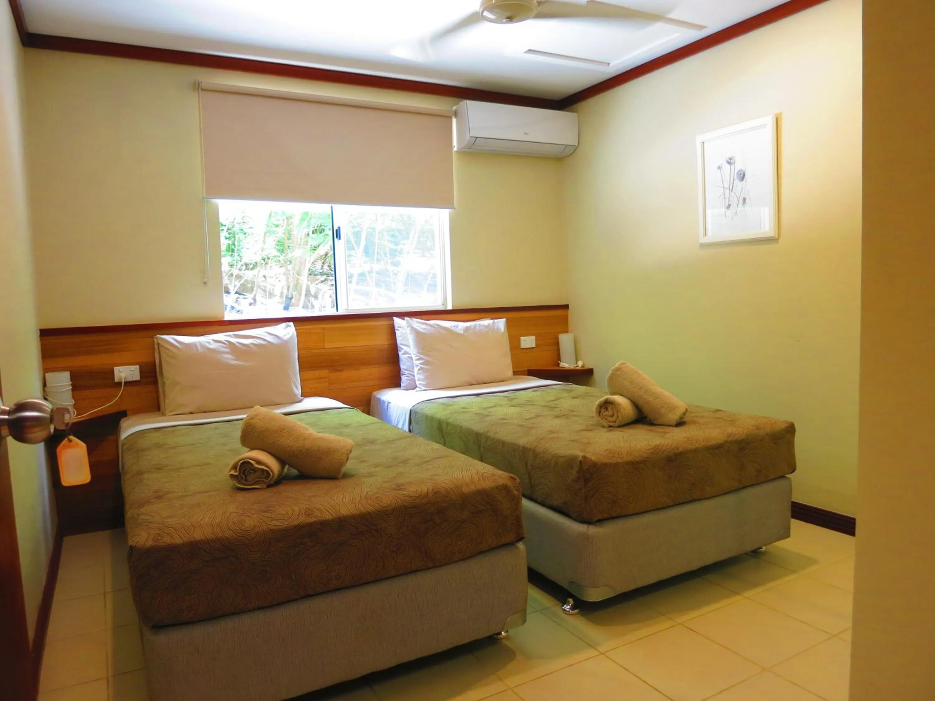 Bed in The Cocos Padang Lodge