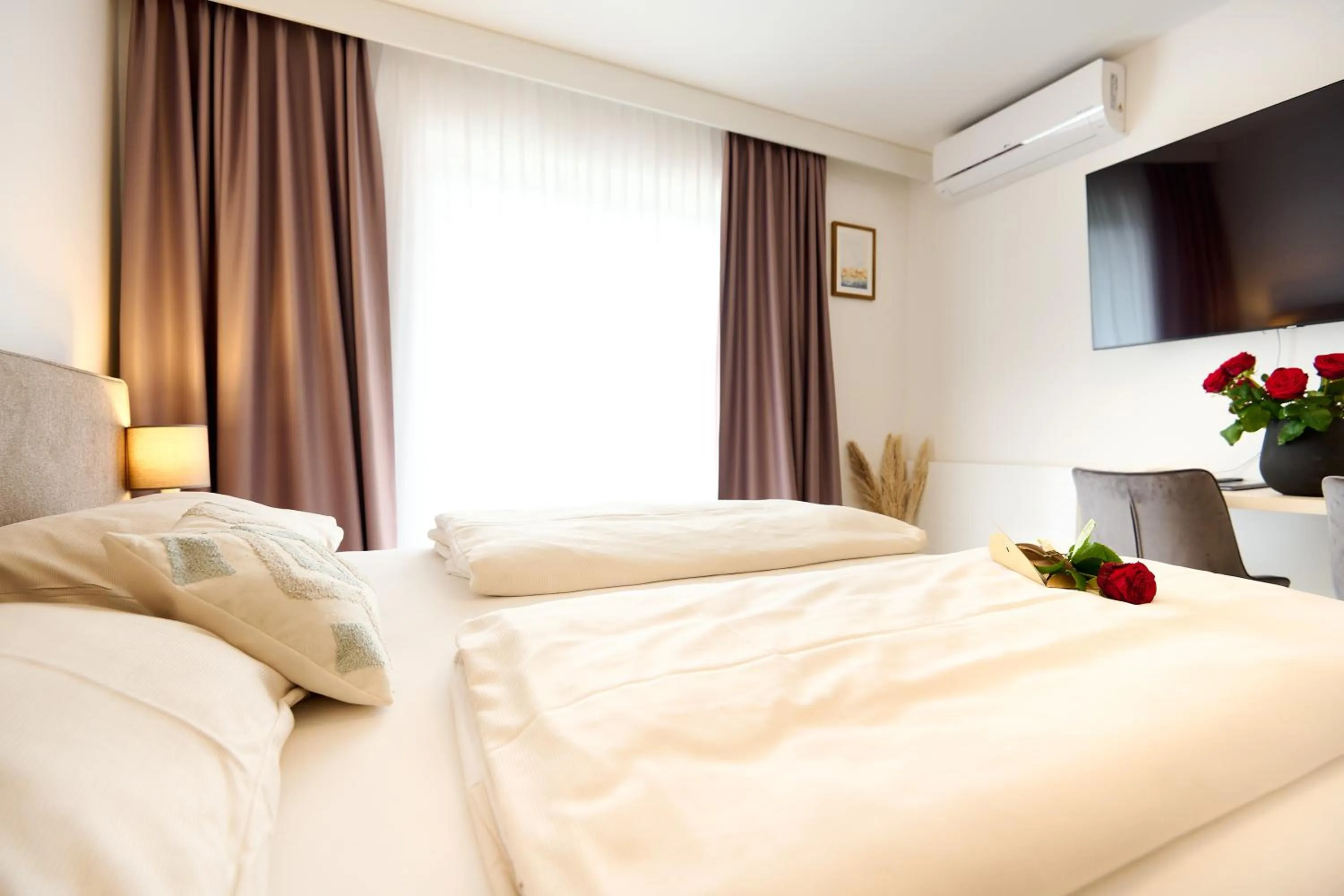 Bed in Pension - Ferienwohnungen Zollner