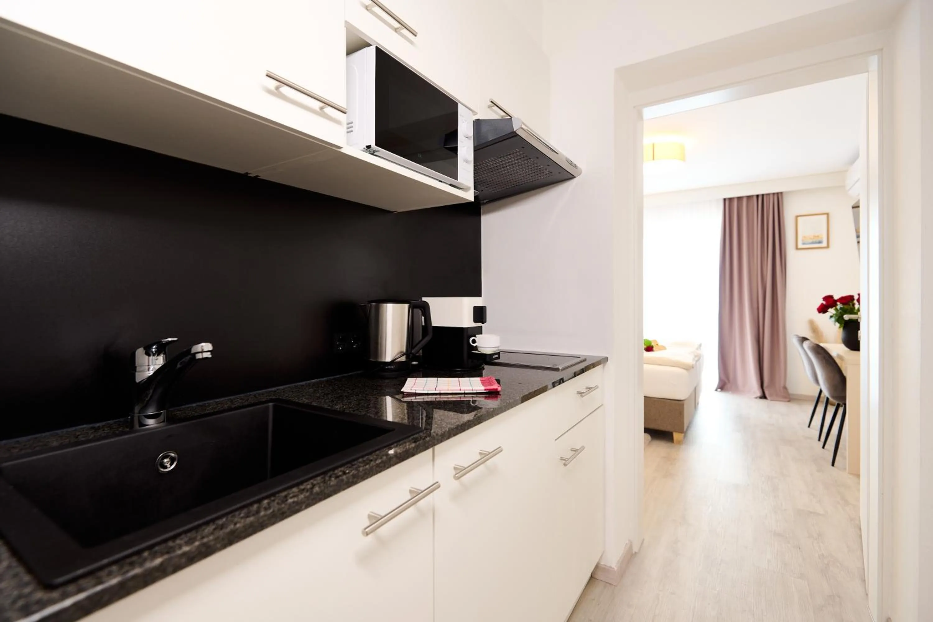 Kitchen or kitchenette in Pension - Ferienwohnungen Zollner