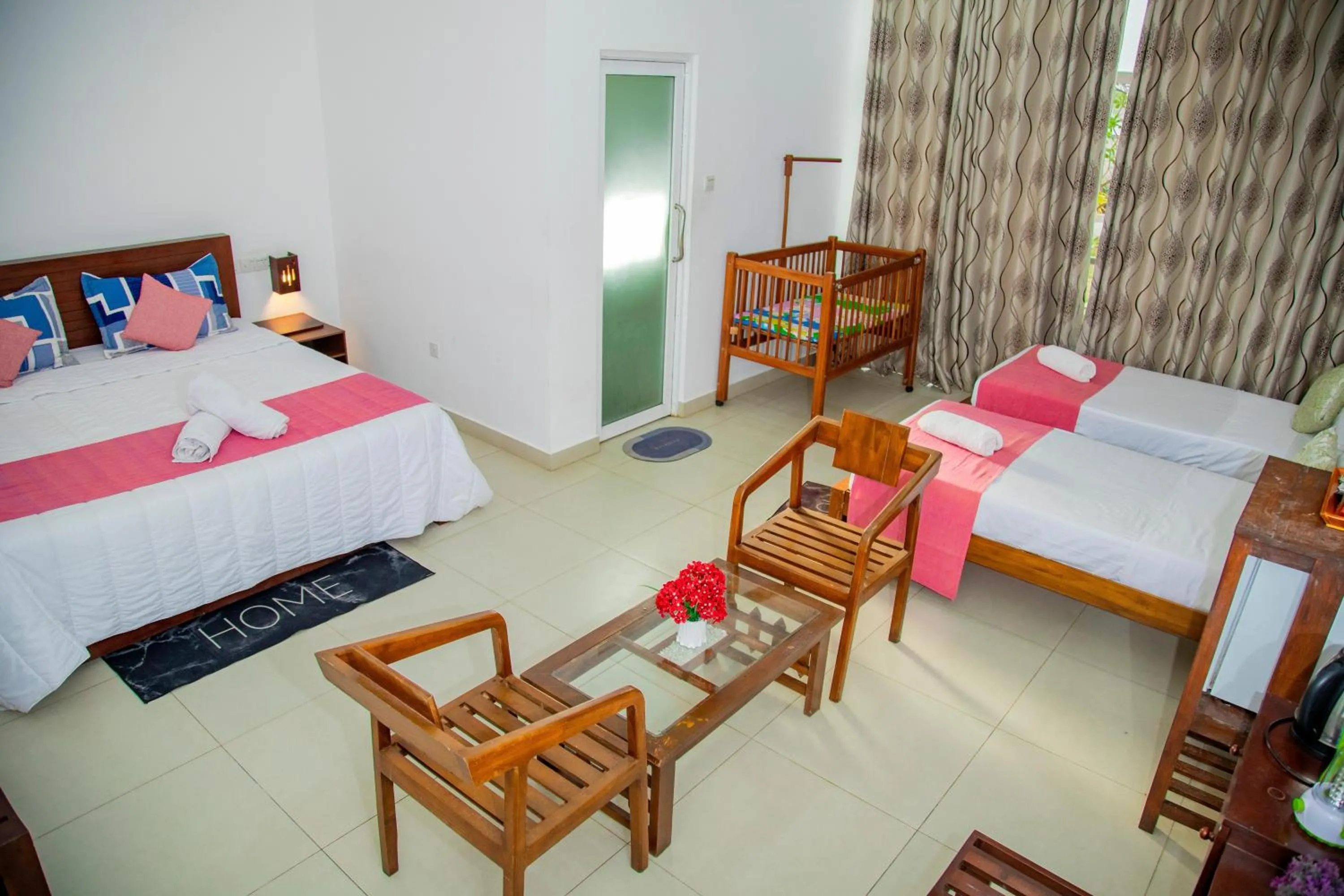 Bed in Ocean Villa Den