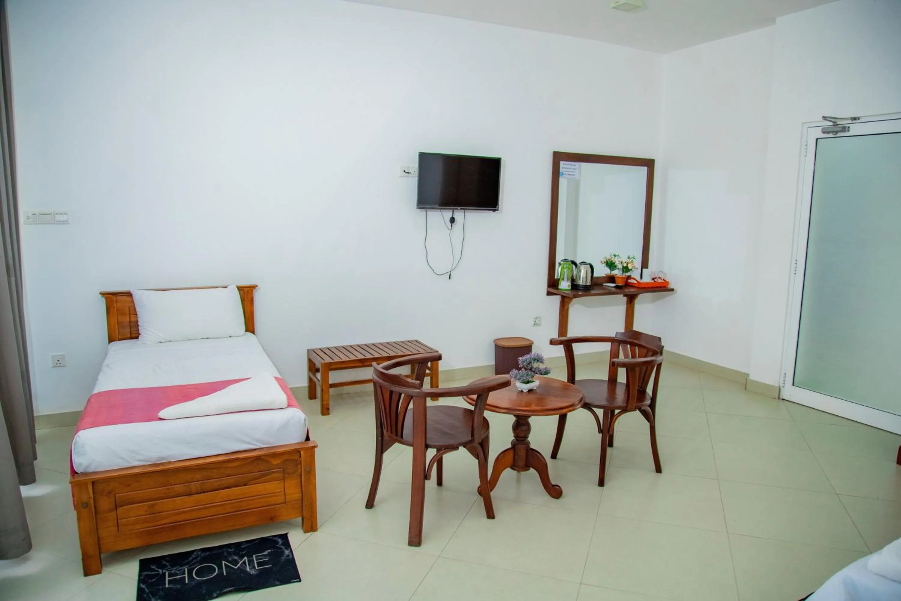 Bed in Ocean Villa Den