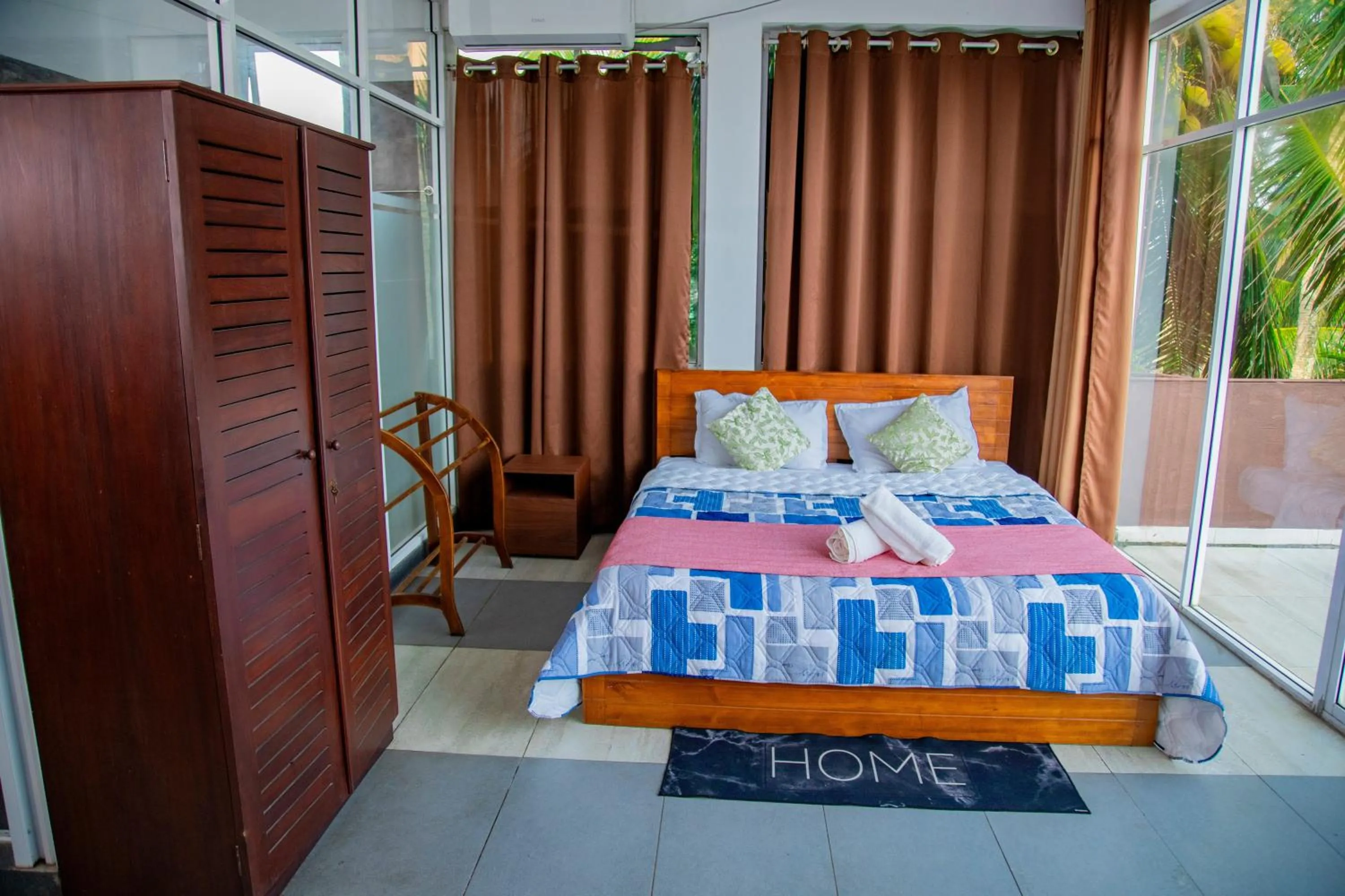 Bed in Ocean Villa Den