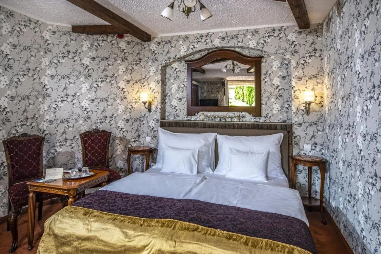 Bed in Erla Villa Boutique Hotel