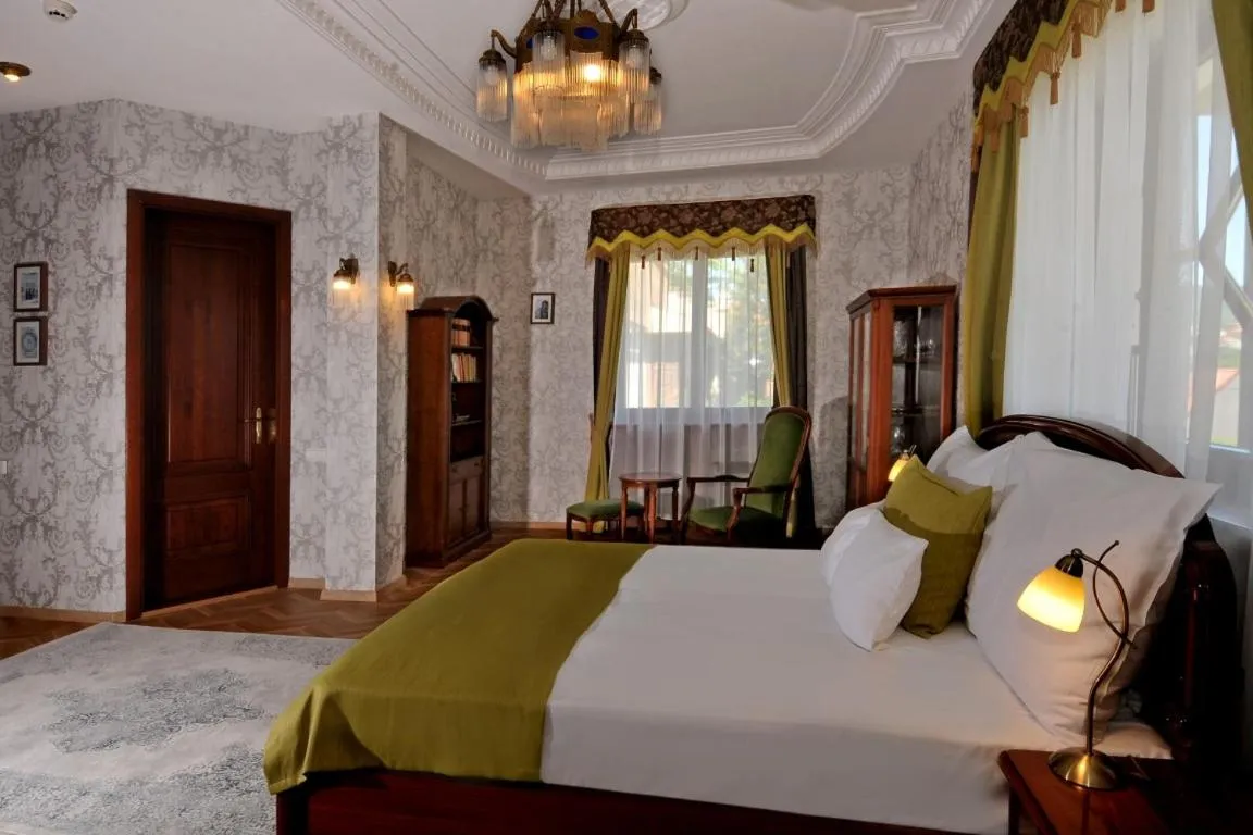 Bed in Erla Villa Boutique Hotel