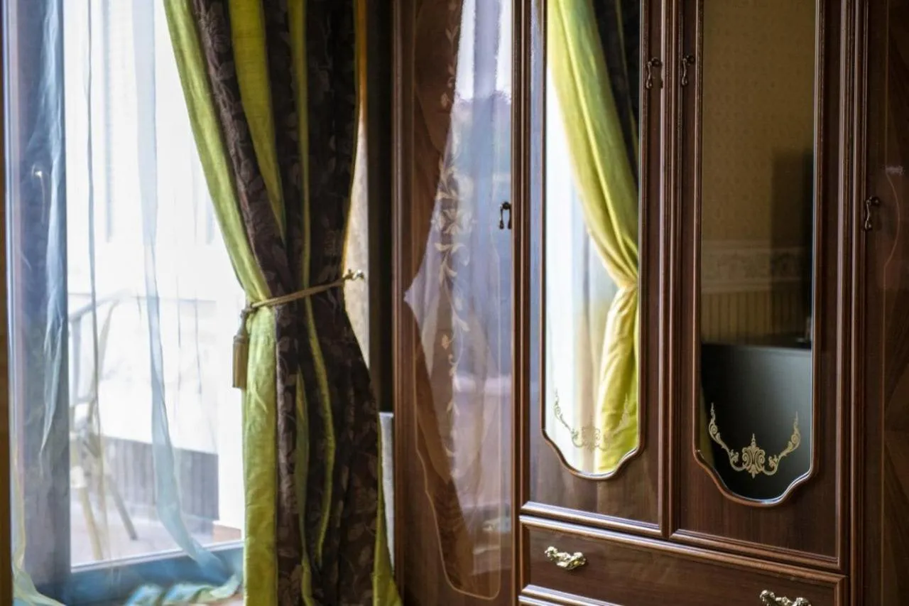 wardrobe in Erla Villa Boutique Hotel