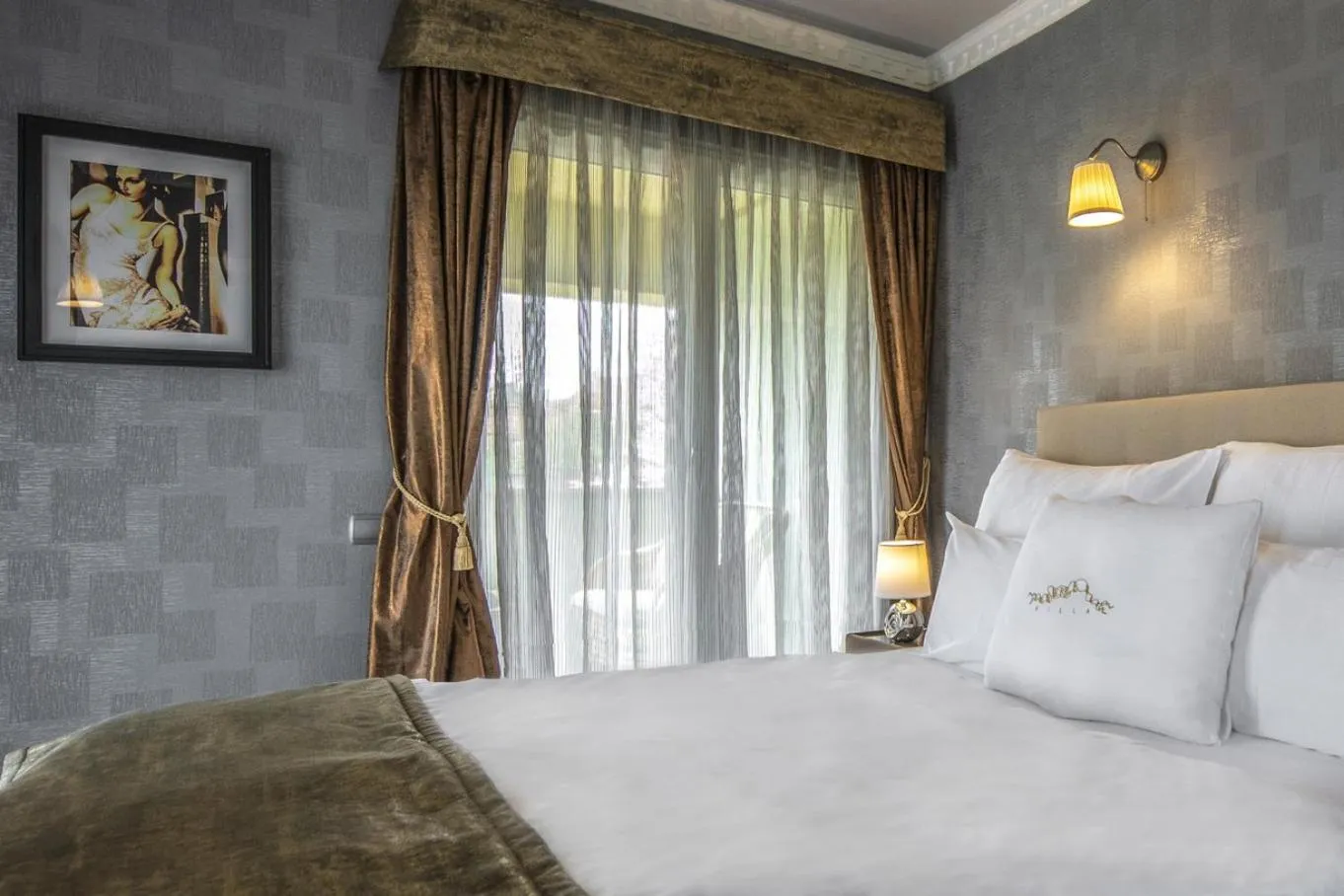 Bed in Erla Villa Boutique Hotel