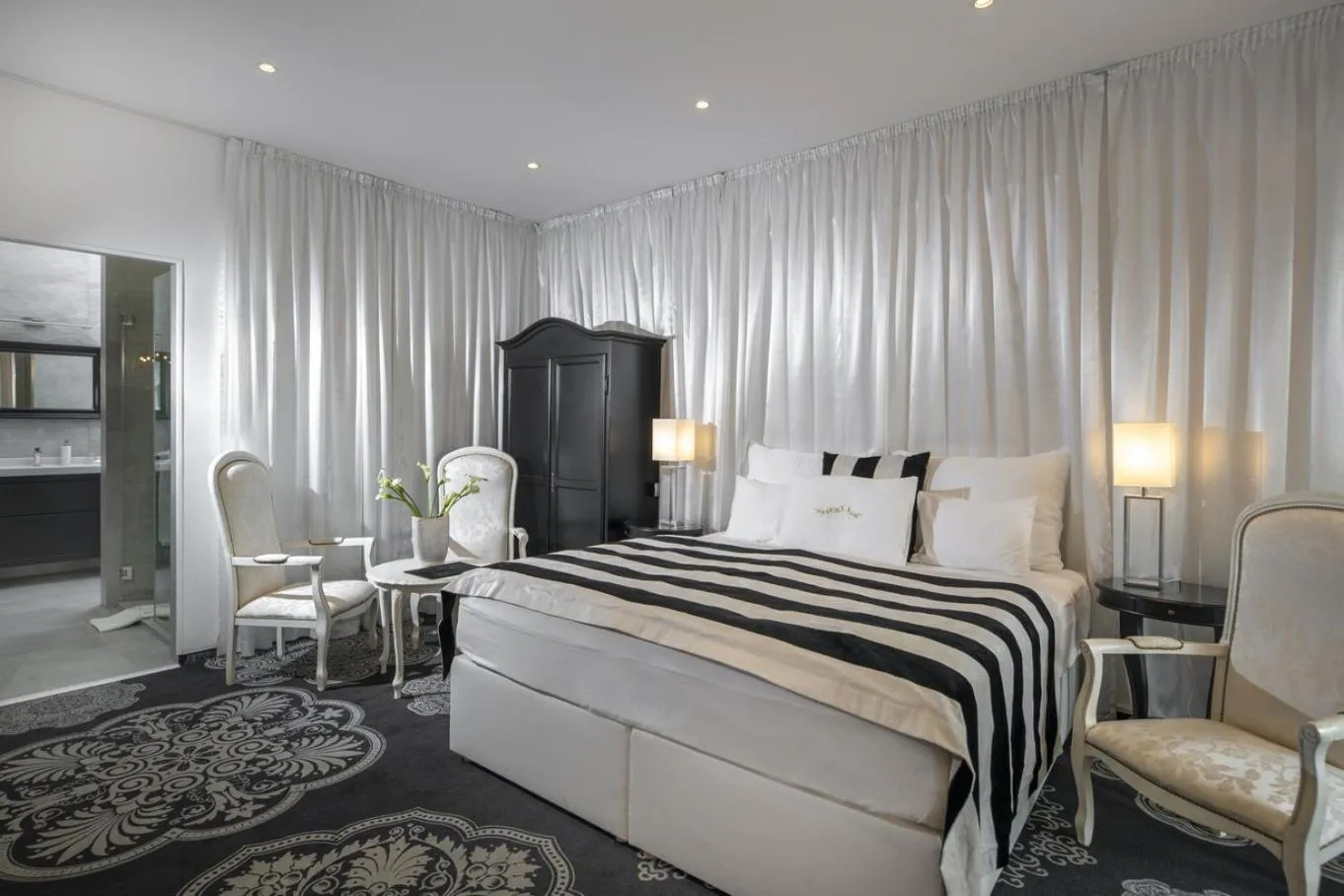 Bed in Erla Villa Boutique Hotel