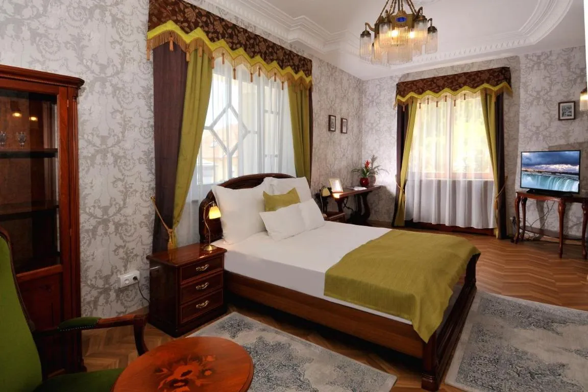 Bed in Erla Villa Boutique Hotel