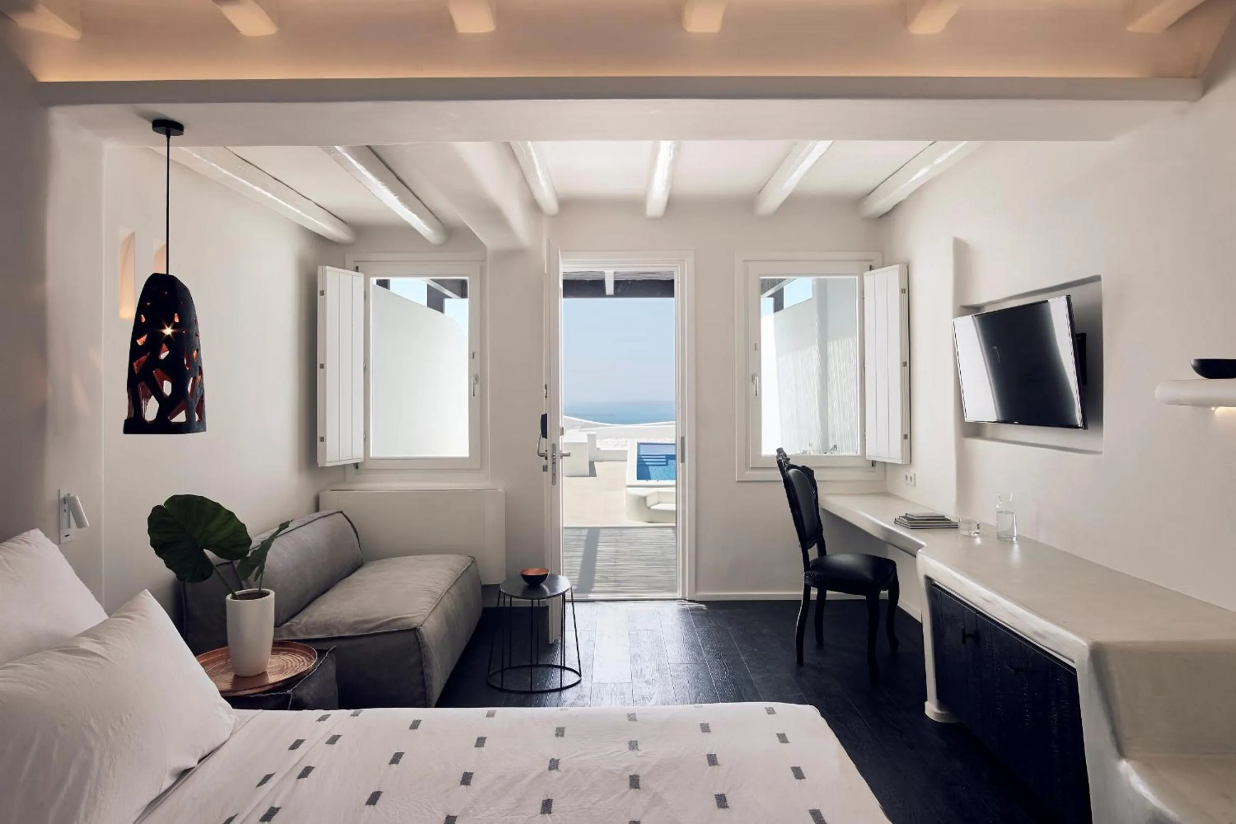 Photo of the whole room, Bed in Cavo Tagoo Santorini