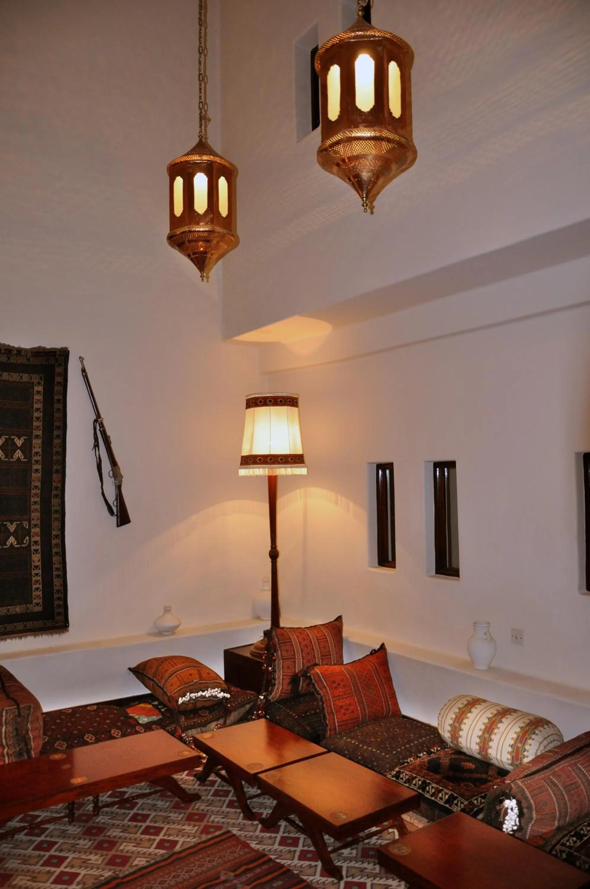 Communal lounge/ TV room, Bed in Quetta Serena Hotel