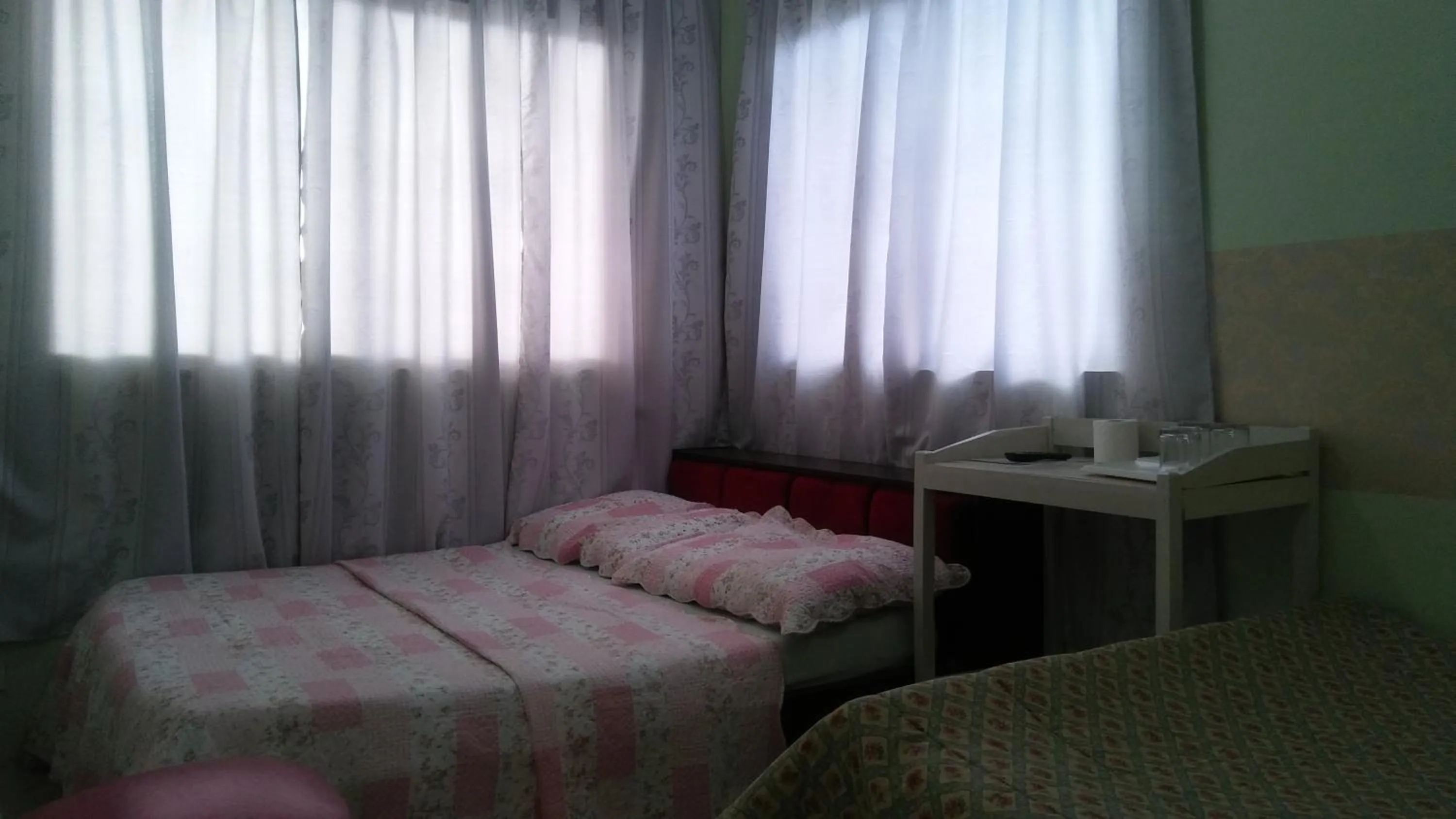 Bed in Dweller's Pensione