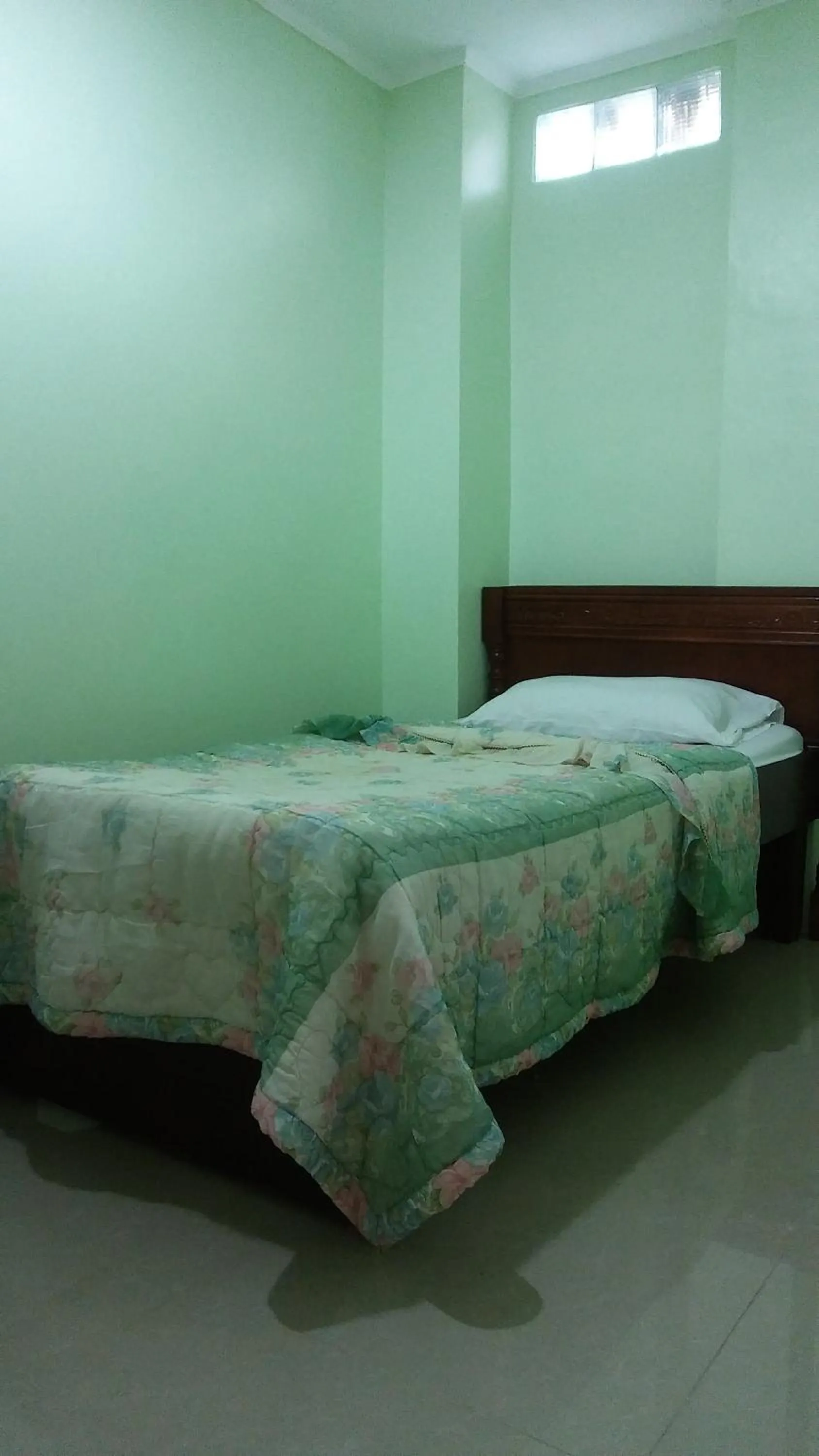 Bed in Dweller's Pensione