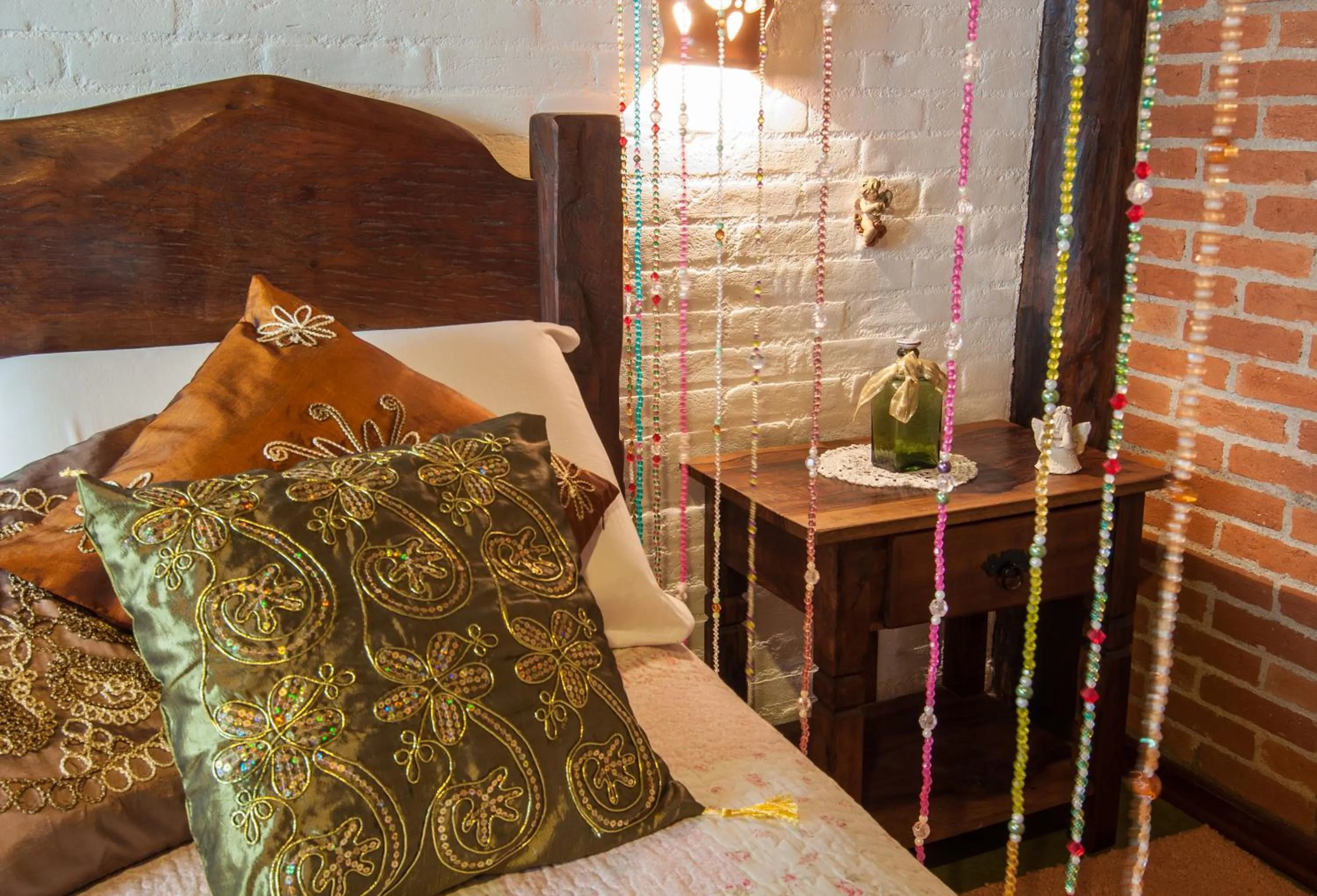 Bed in Pousada Alto da Neblina