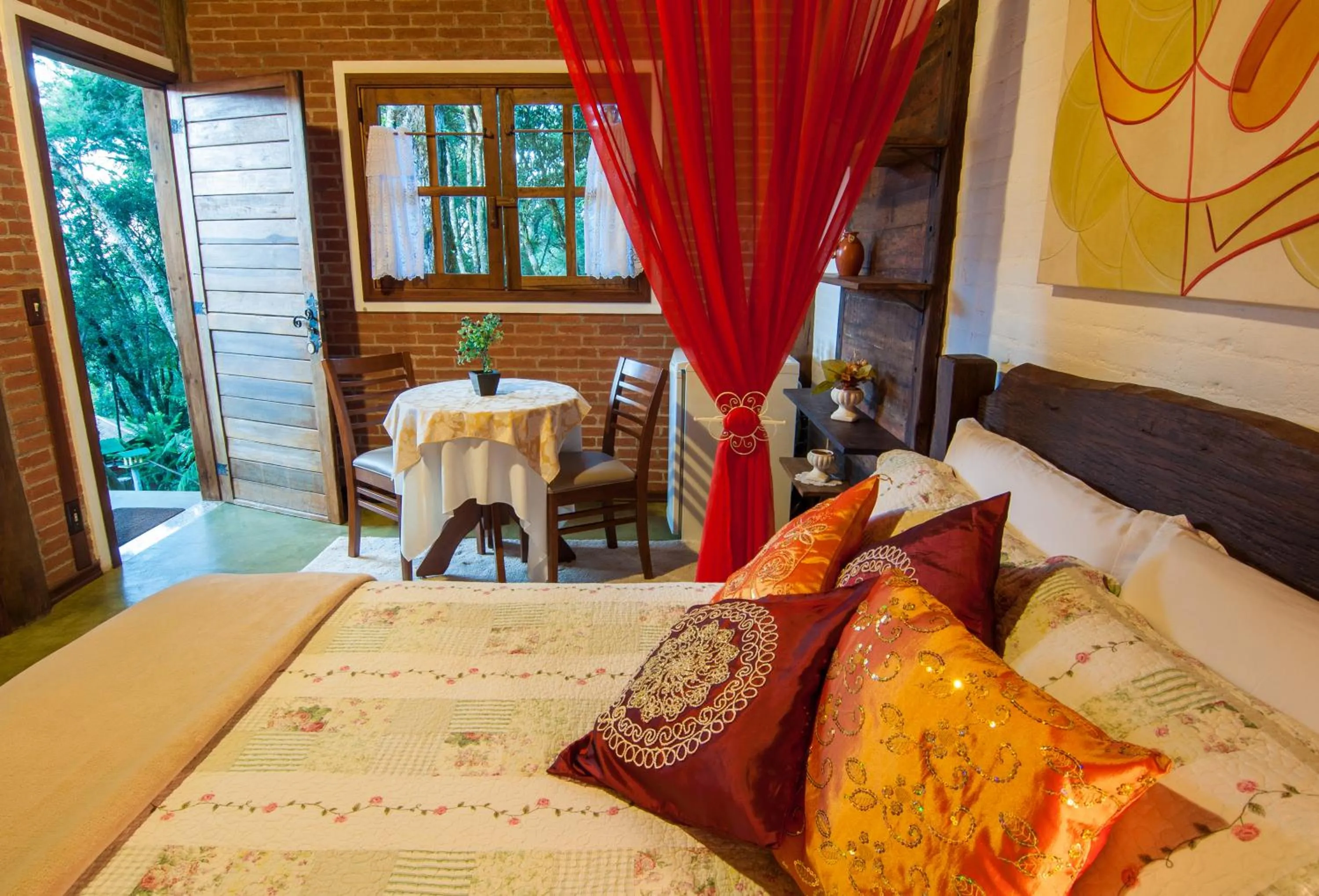 Bed in Pousada Alto da Neblina