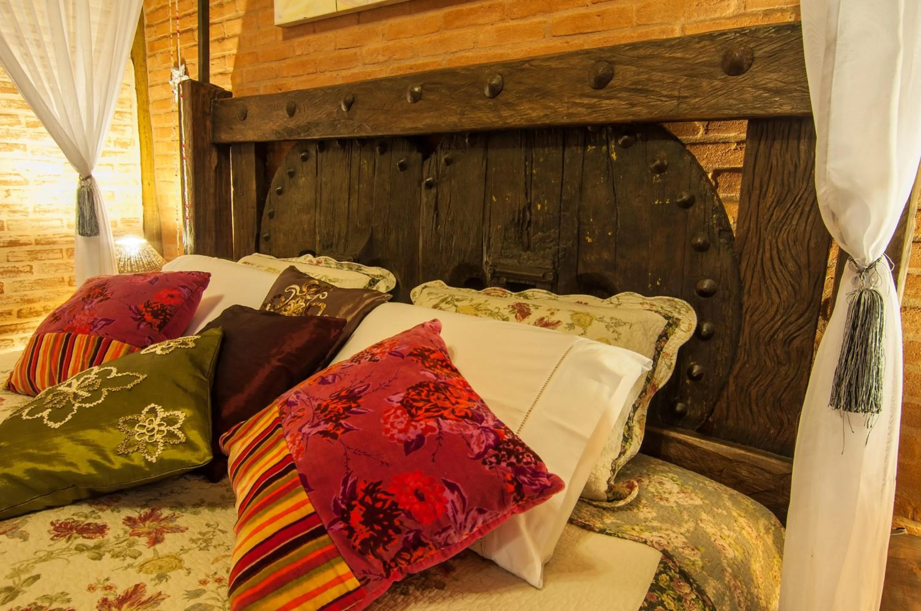 Bed in Pousada Alto da Neblina