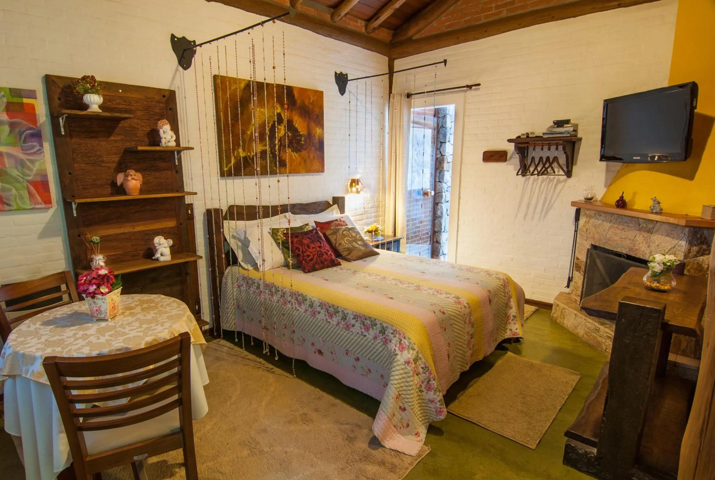 Bed in Pousada Alto da Neblina