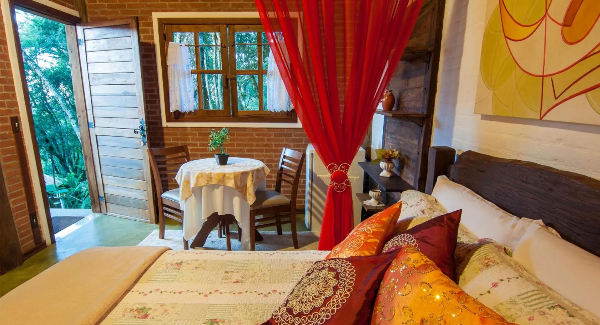 Bed in Pousada Alto da Neblina