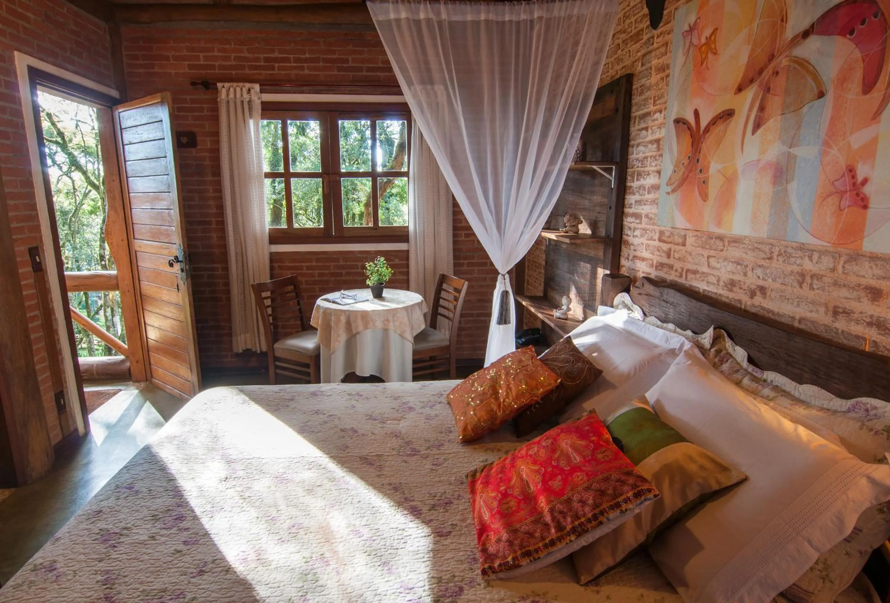 Bed in Pousada Alto da Neblina