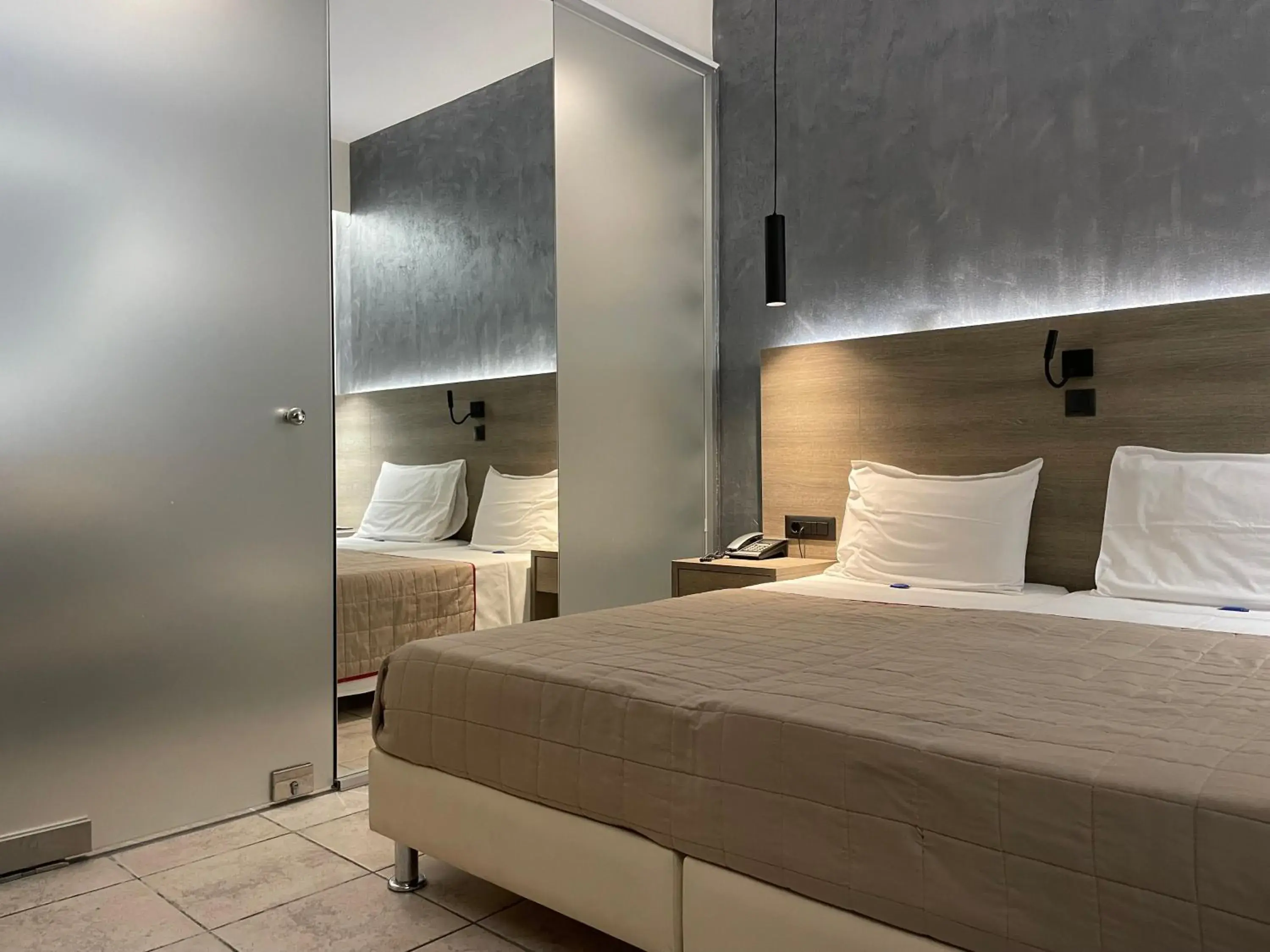 Bed in Voula Hotel Bed in Voula Hotel