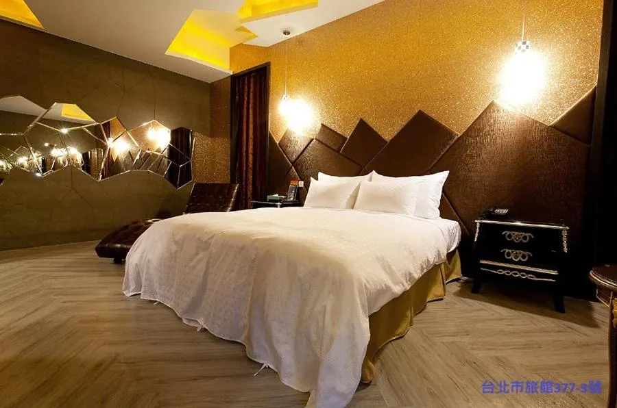 Bed in 探索汽車旅館 延平館 台北市旅館377-3號