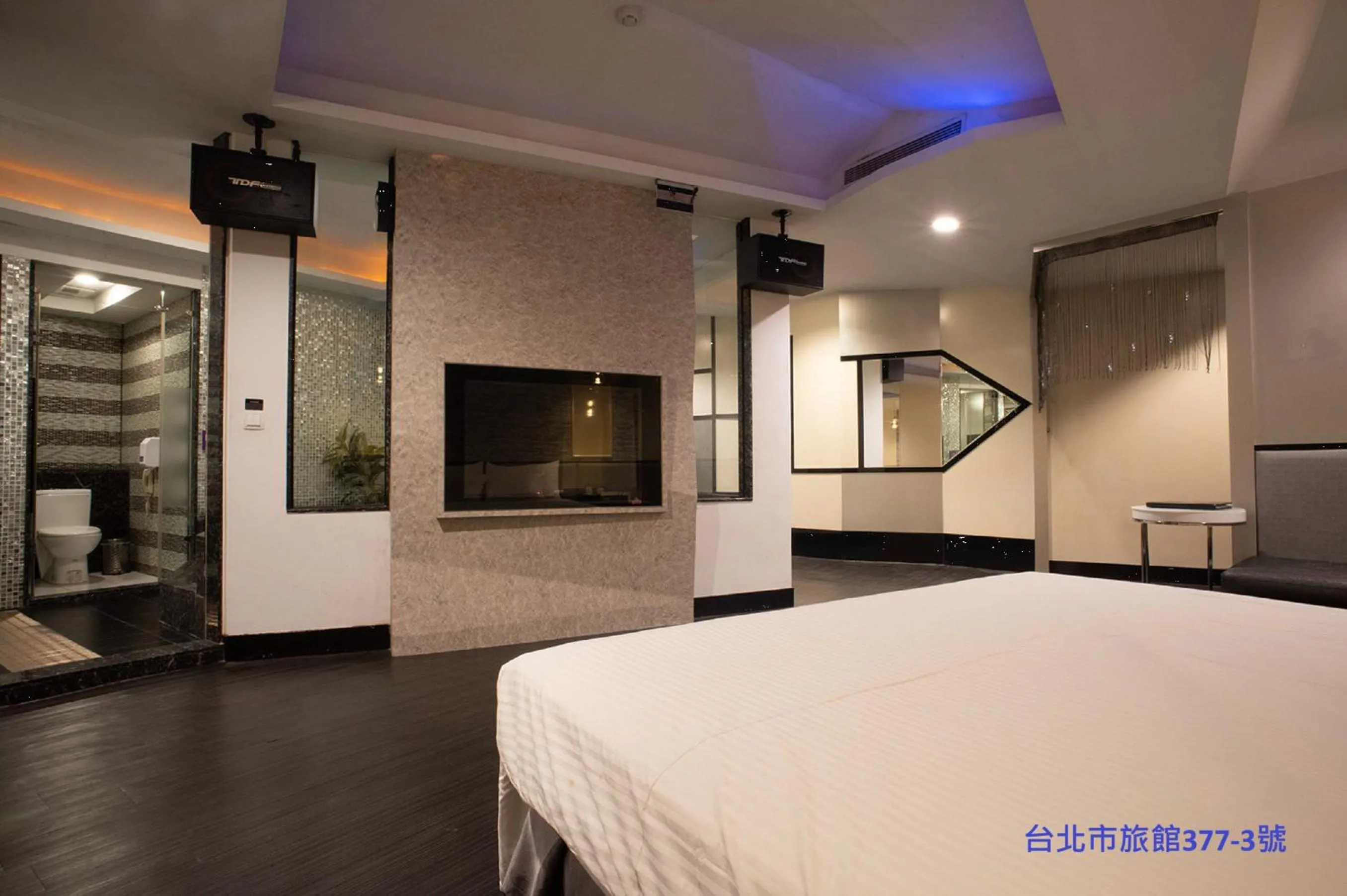 Bed in 探索汽車旅館 延平館 台北市旅館377-3號